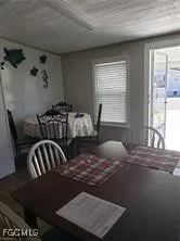 a bedroom with furniture and window