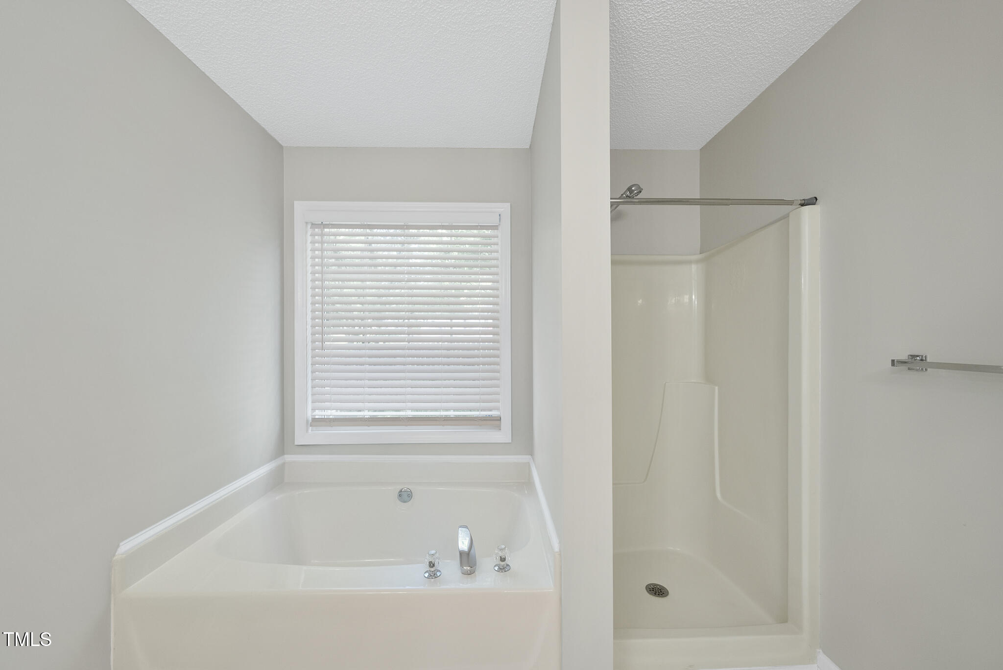 3519 Streams Of Fields Drive Raleigh, NC 27604 - Photo 11 of 20 a bathroom with a bathtub