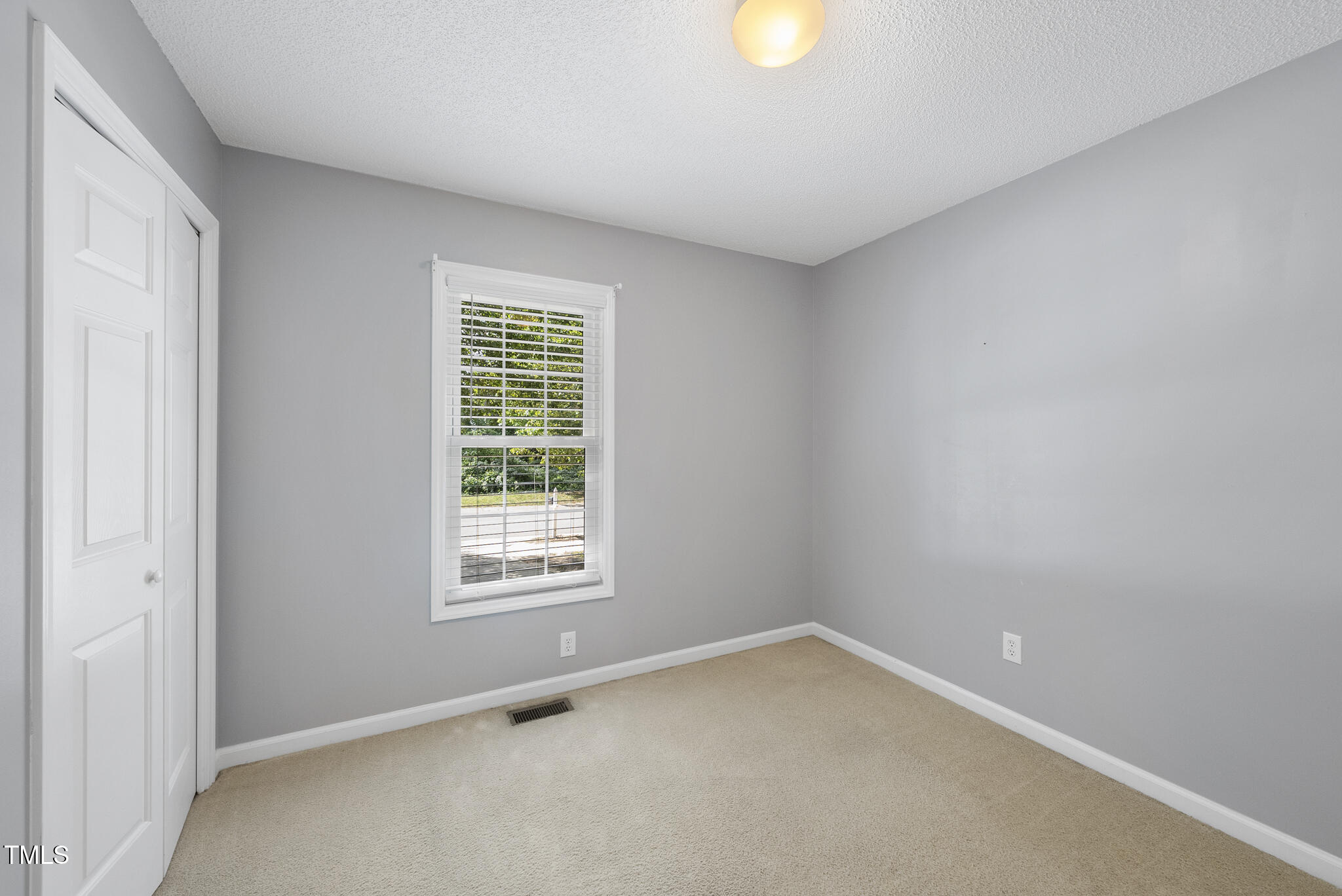 3519 Streams Of Fields Drive Raleigh, NC 27604 - Photo 13 of 20 a view of an empty room with a window