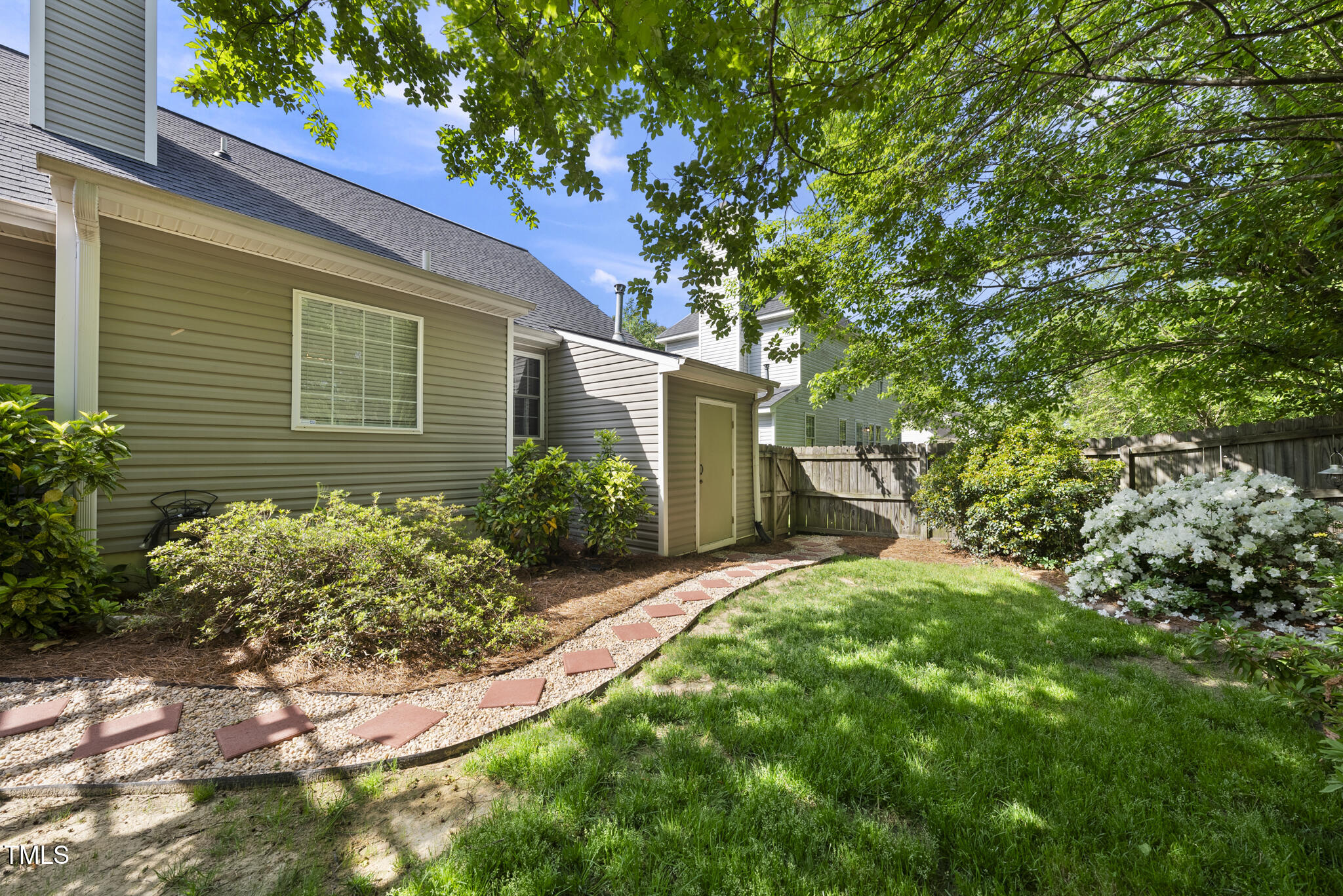 3519 Streams Of Fields Drive Raleigh, NC 27604 - Photo 18 of 20 a front view of a house with a yard and plants