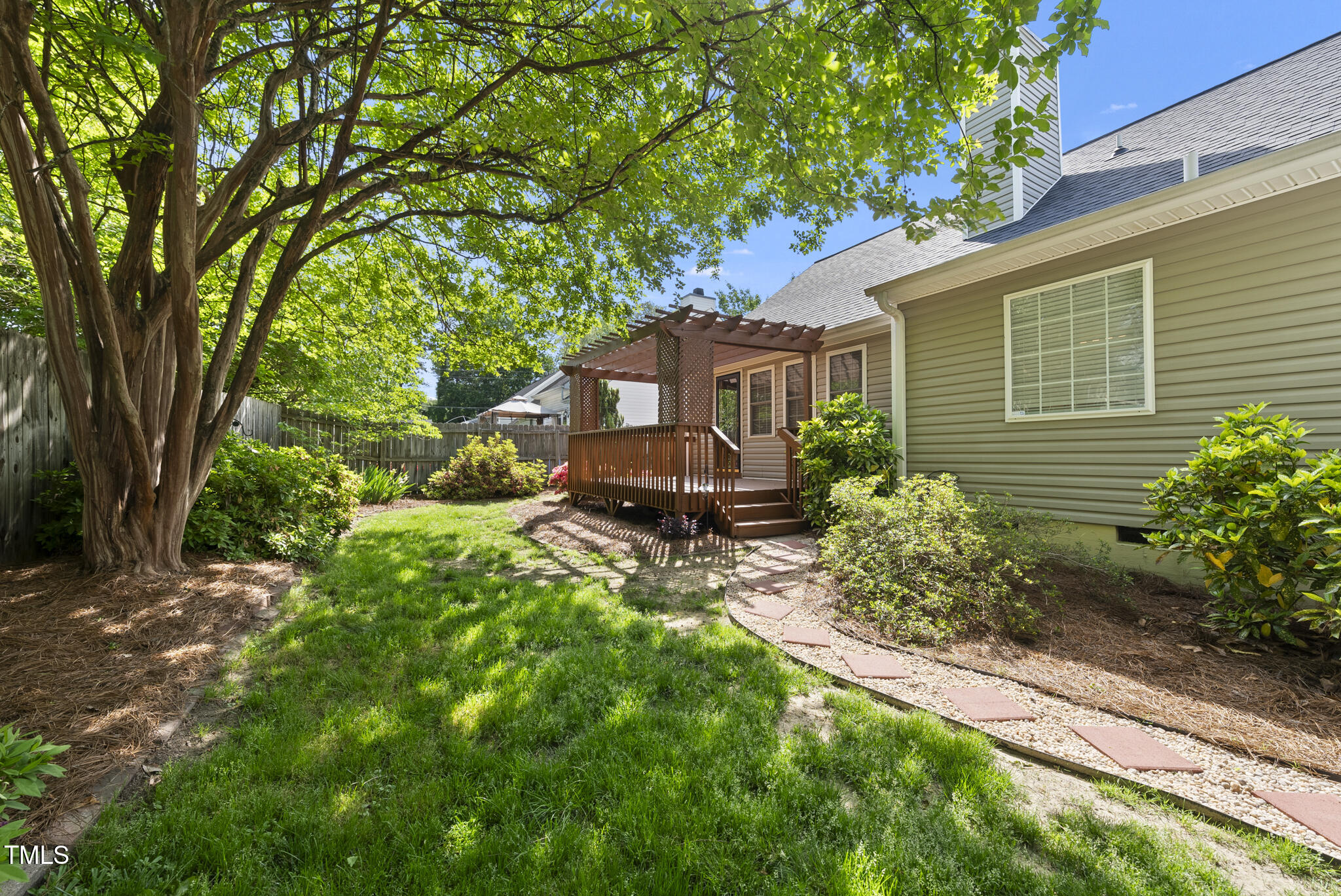 3519 Streams Of Fields Drive Raleigh, NC 27604 - Photo 19 of 20 a front view of a house with garden