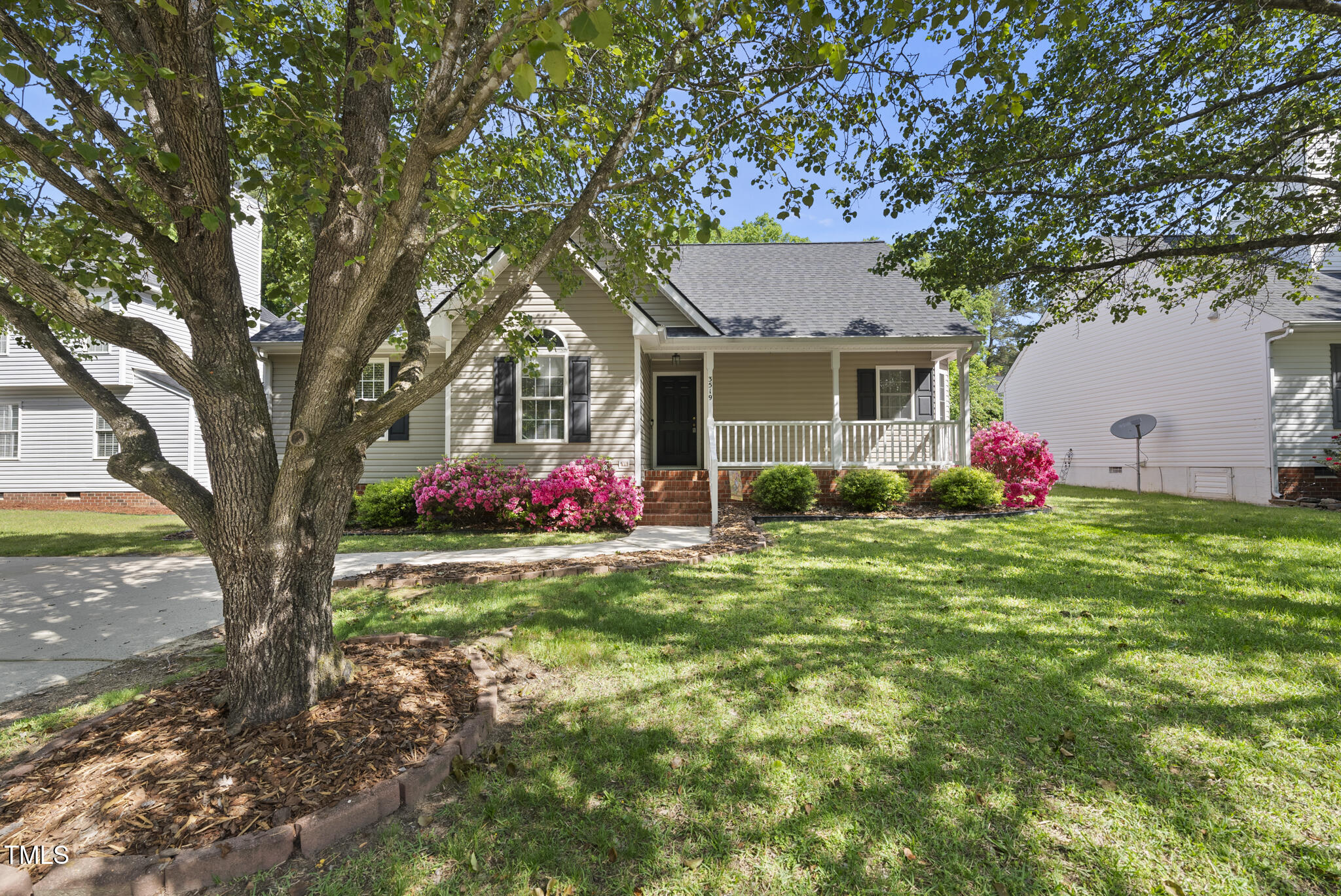 3519 Streams Of Fields Drive Raleigh, NC 27604 - Photo 2 of 20 a front view of house with yard and trees