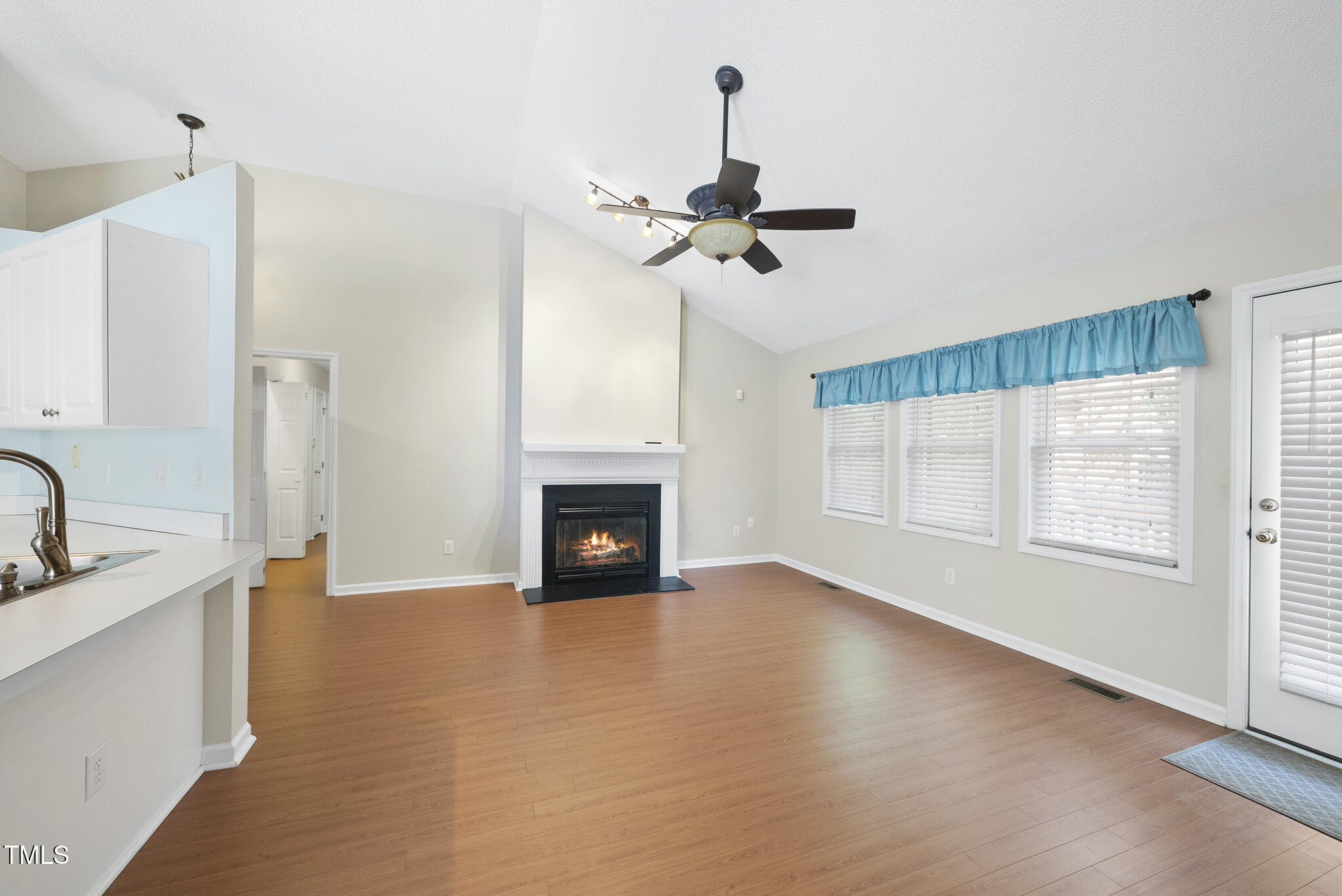 3519 Streams Of Fields Drive Raleigh, NC 27604 - Photo 5 of 20 a view of a kitchen with a sink a ceiling fan and a kitchen view