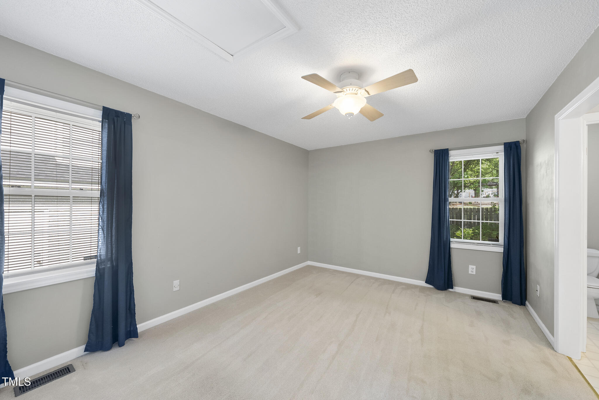 3519 Streams Of Fields Drive Raleigh, NC 27604 - Photo 9 of 20 a view of an empty room with a window