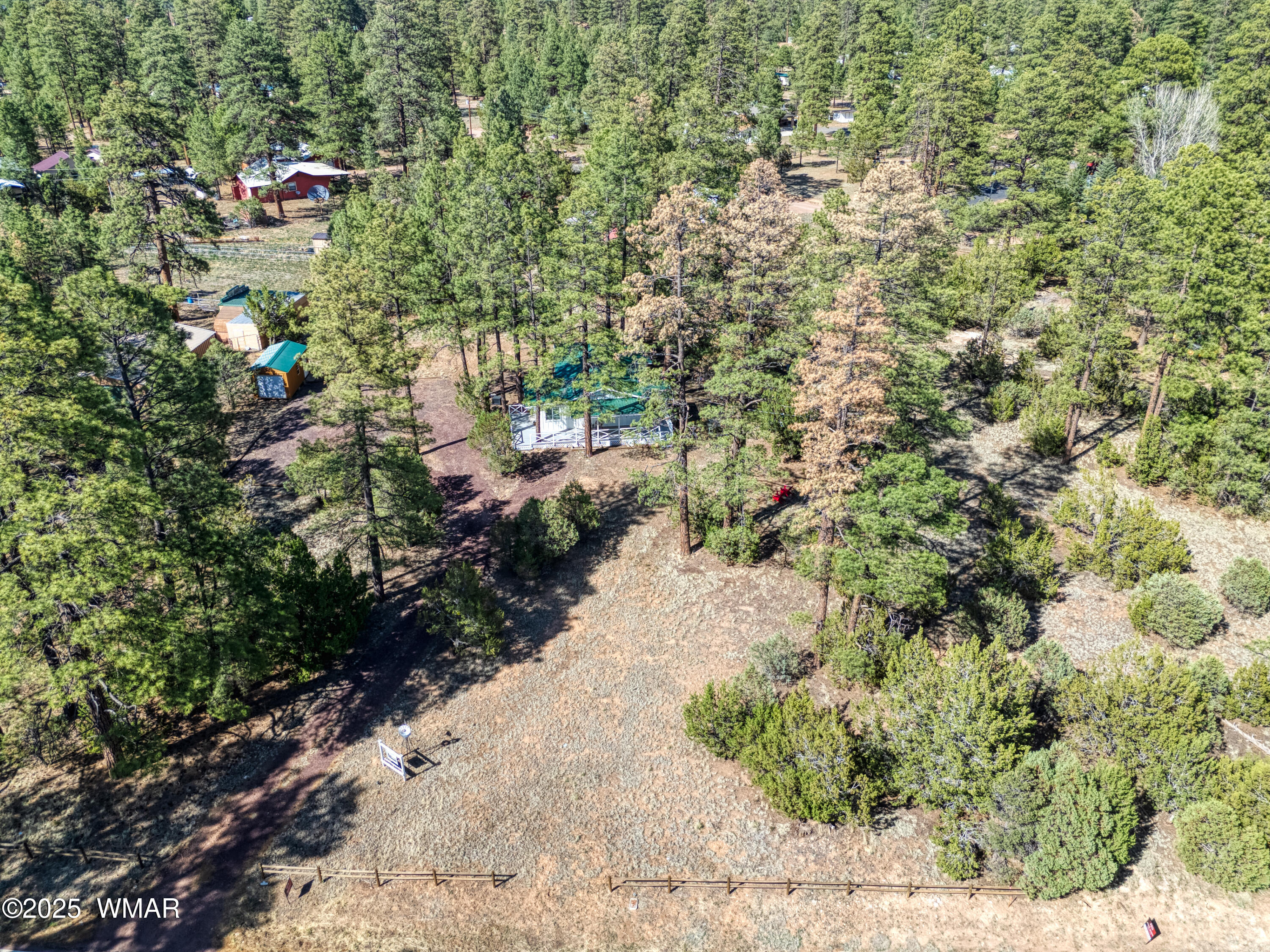 2905 Pine Rim Road Overgaard, AZ 85933 - Photo 3 of 19 a view of aerial view of residential houses with outdoor space and trees