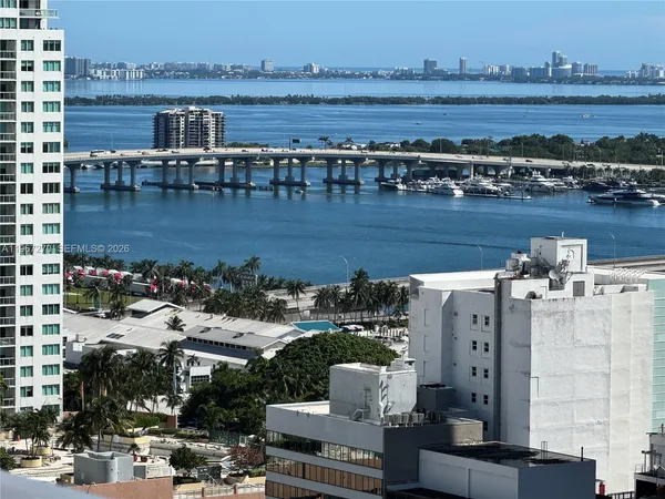a view of a lake with building in front of it