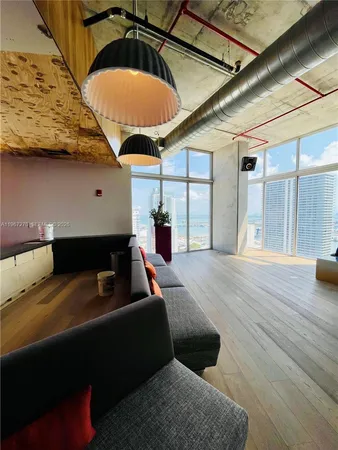 a bedroom with bed and window