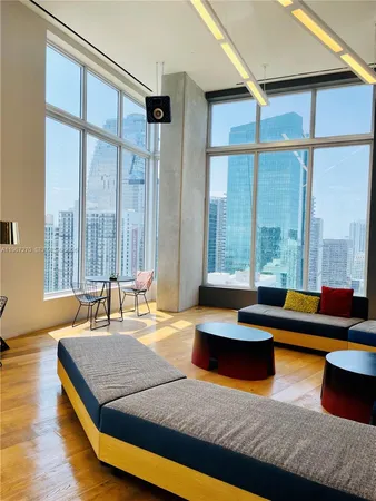 a living room with large window