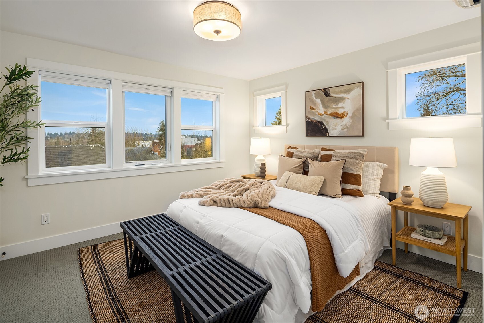 721 North 97th Street Seattle, WA 98103 - Photo 17 of 35 a bedroom with bed and a window