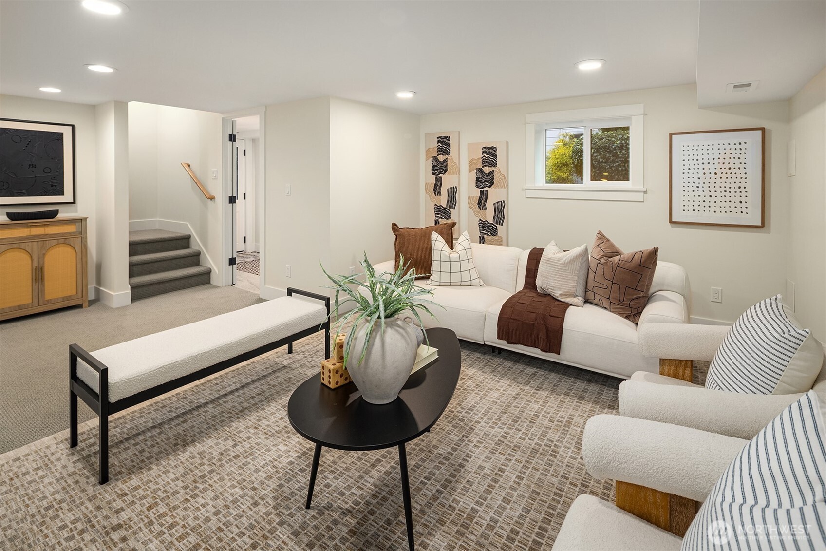 721 North 97th Street Seattle, WA 98103 - Photo 22 of 35 a living room with furniture and a flat screen tv