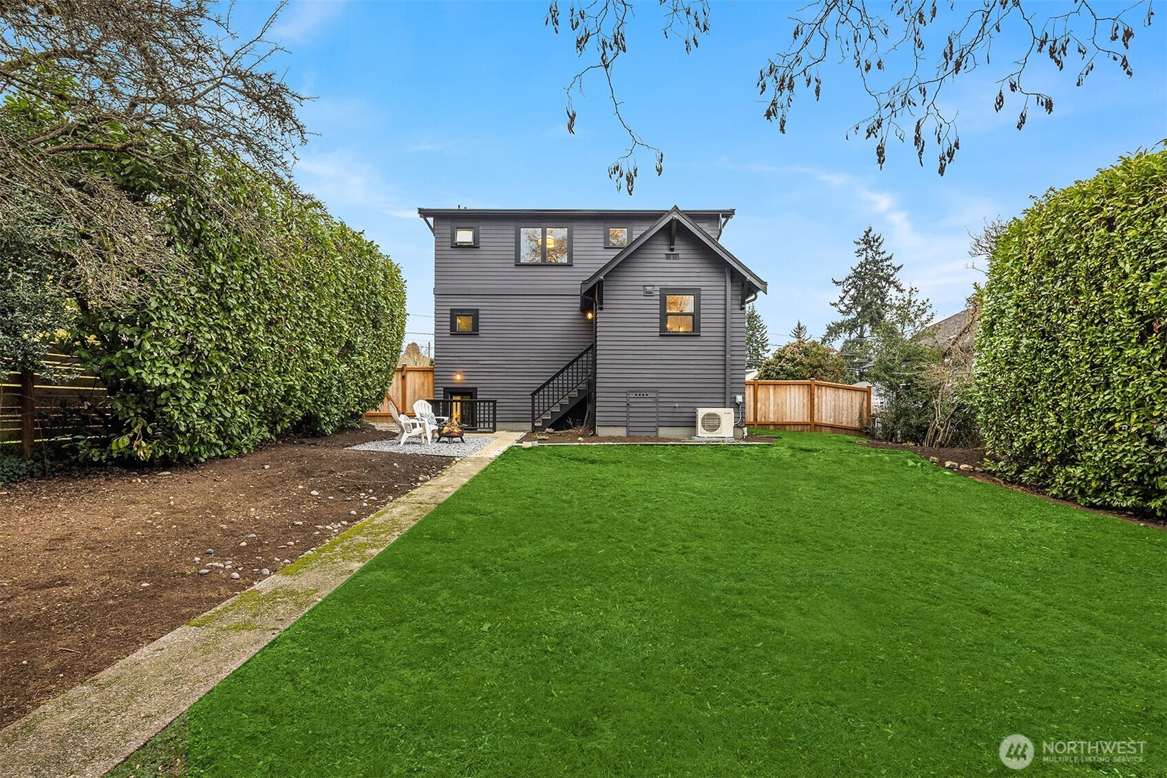 721 North 97th Street Seattle, WA 98103 - Photo 32 of 35 a front view of a house with a yard