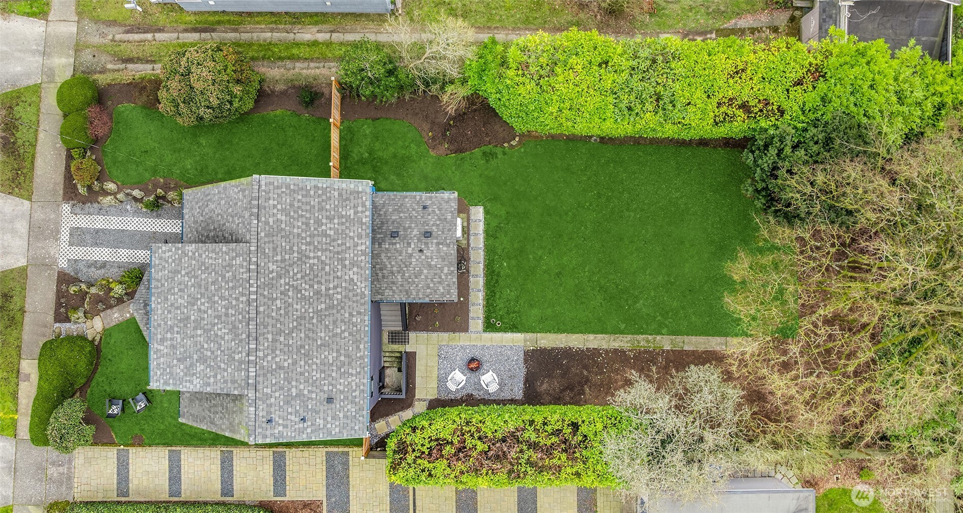 721 North 97th Street Seattle, WA 98103 - Photo 33 of 35 a view of a garden with plants