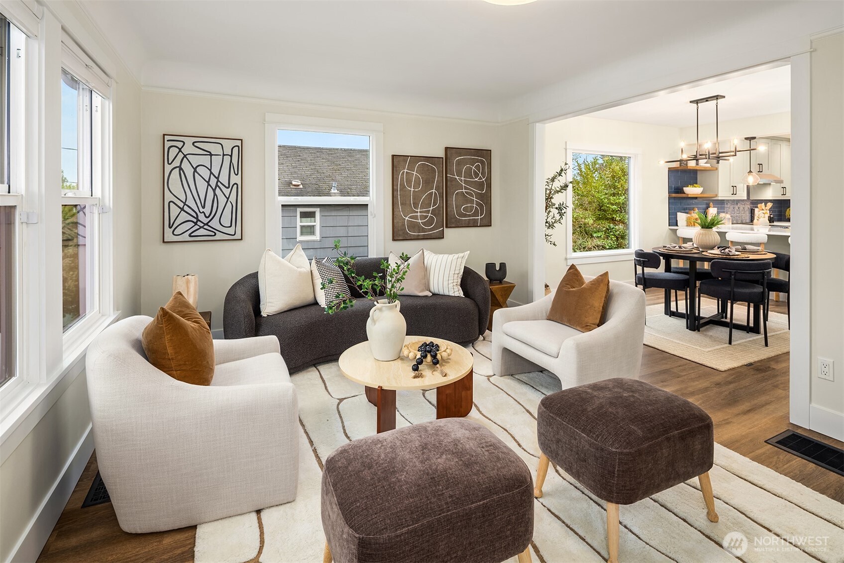 721 North 97th Street Seattle, WA 98103 - Photo 5 of 35 a living room with furniture and a large window