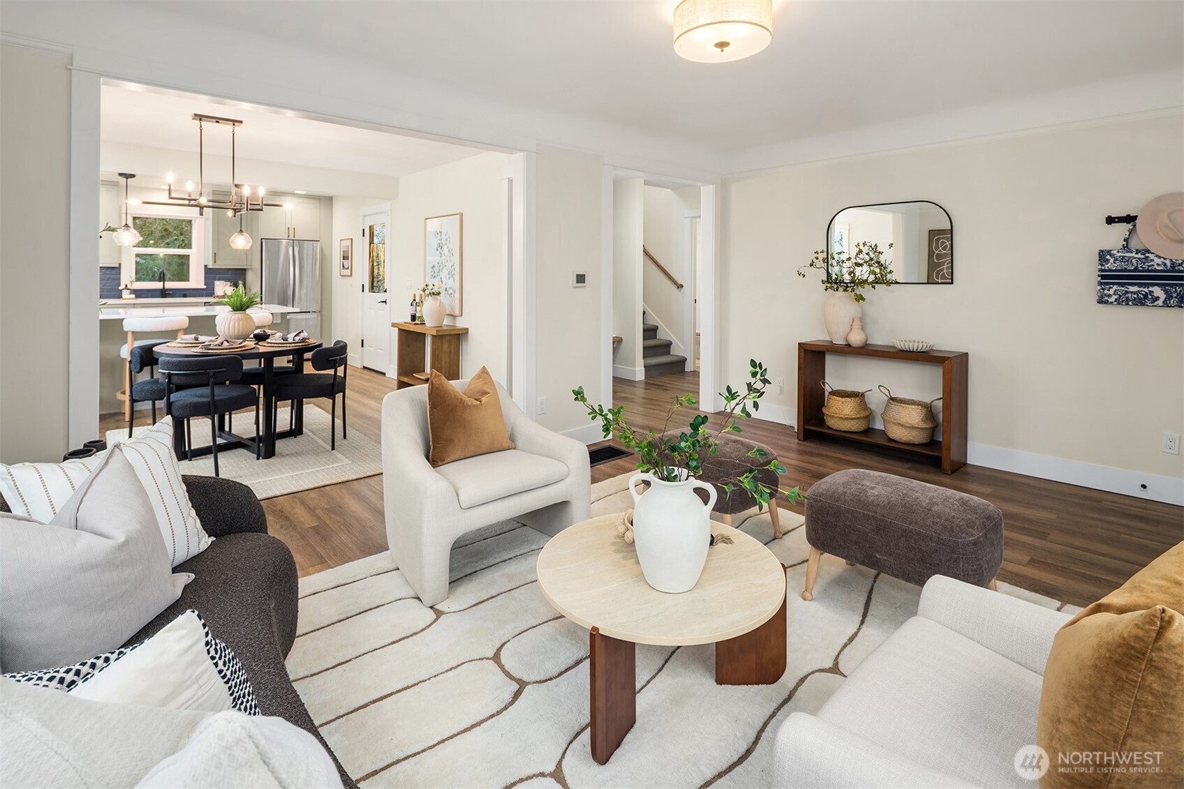 721 North 97th Street Seattle, WA 98103 - Photo 6 of 35 a living room with furniture potted plant and a fireplace