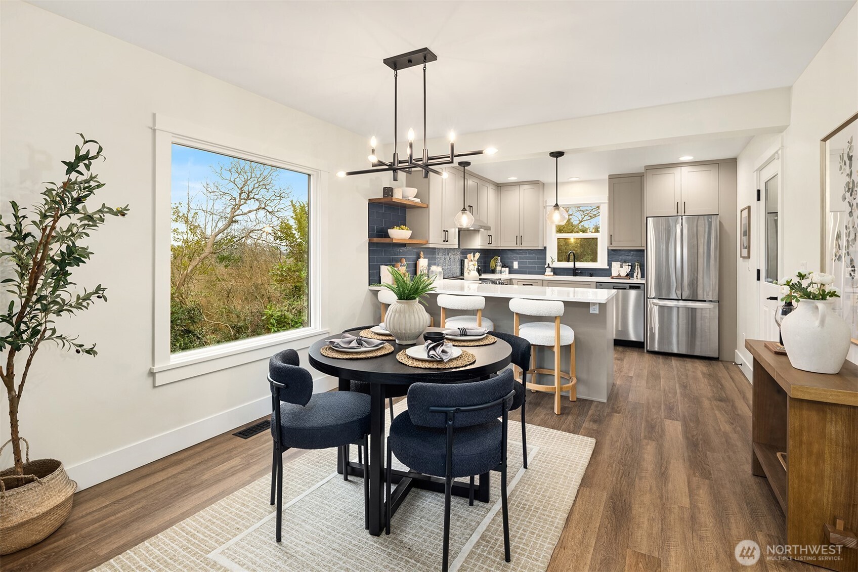 721 North 97th Street Seattle, WA 98103 - Photo 7 of 35 a view of a dining room with furniture window and wooden floor