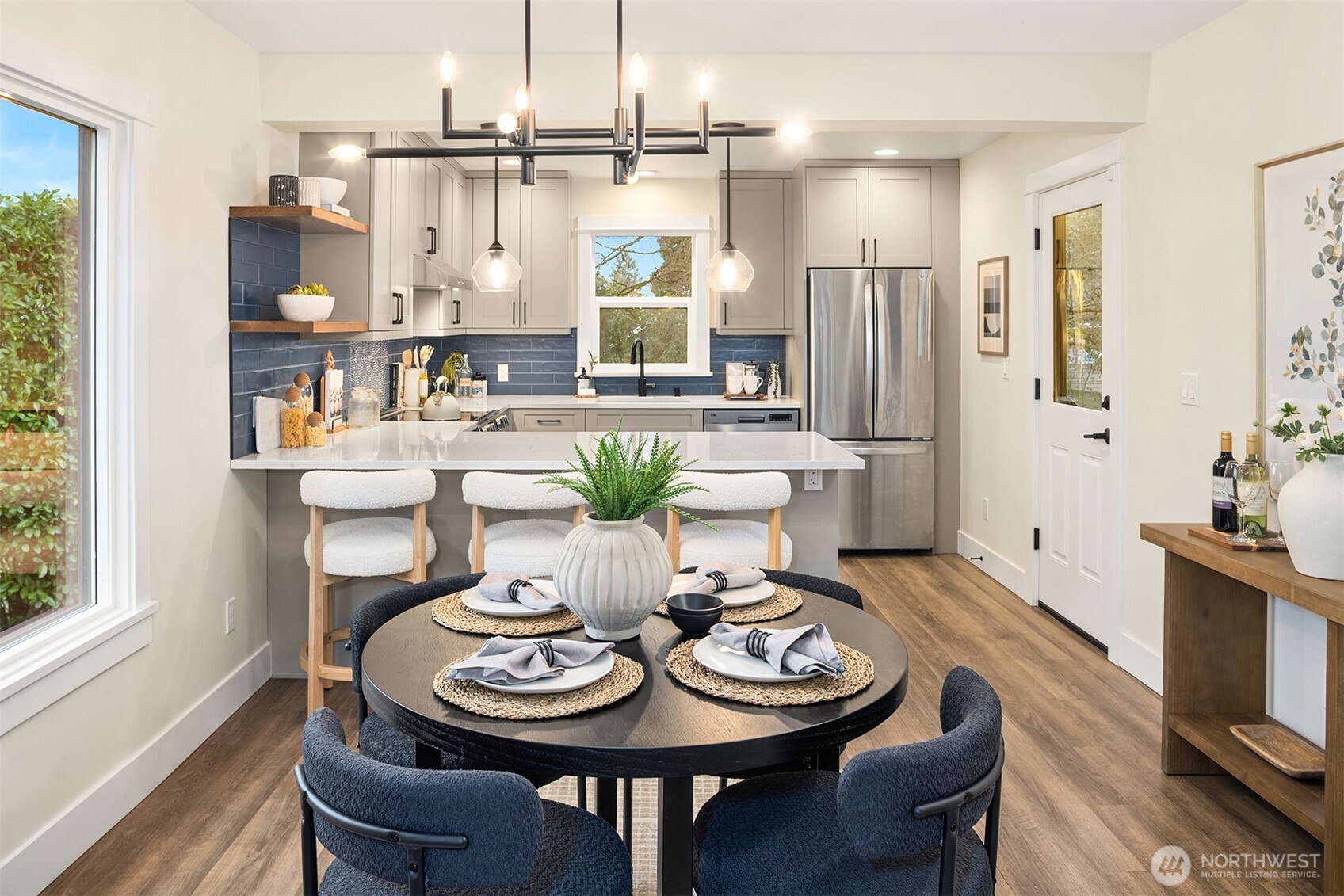 721 North 97th Street Seattle, WA 98103 - Photo 8 of 35 a view of a dining room with furniture window and wooden floor