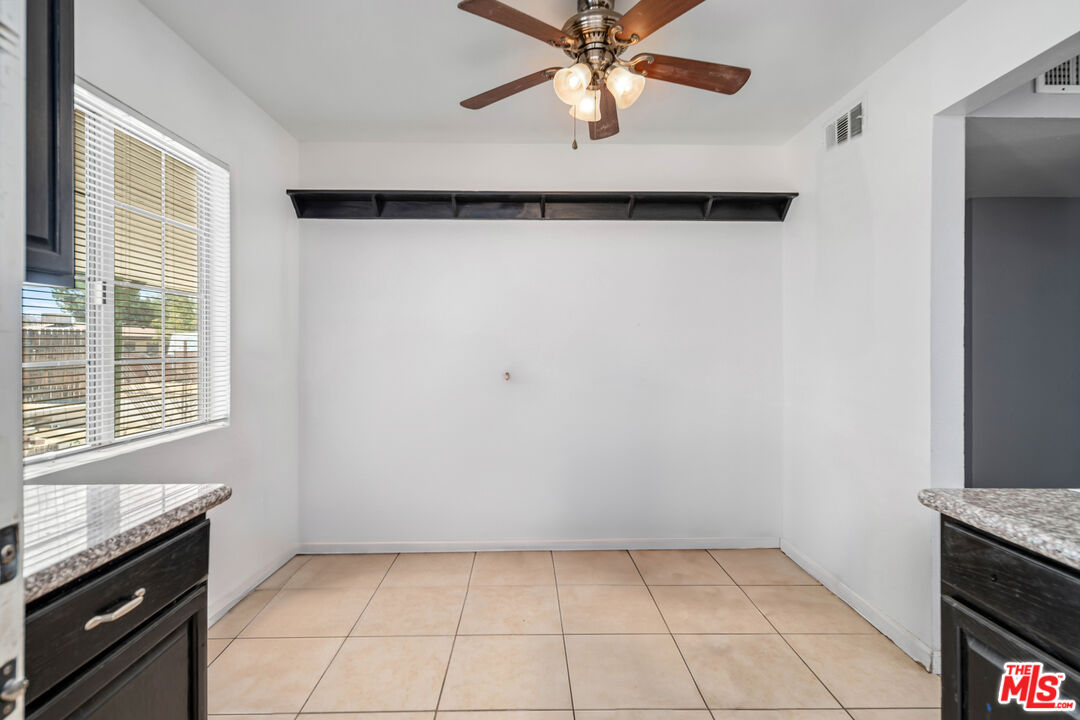 15872 Rexroth Drive Mojave, CA 93501 - Photo 9 of 20 a view of an empty room with a window
