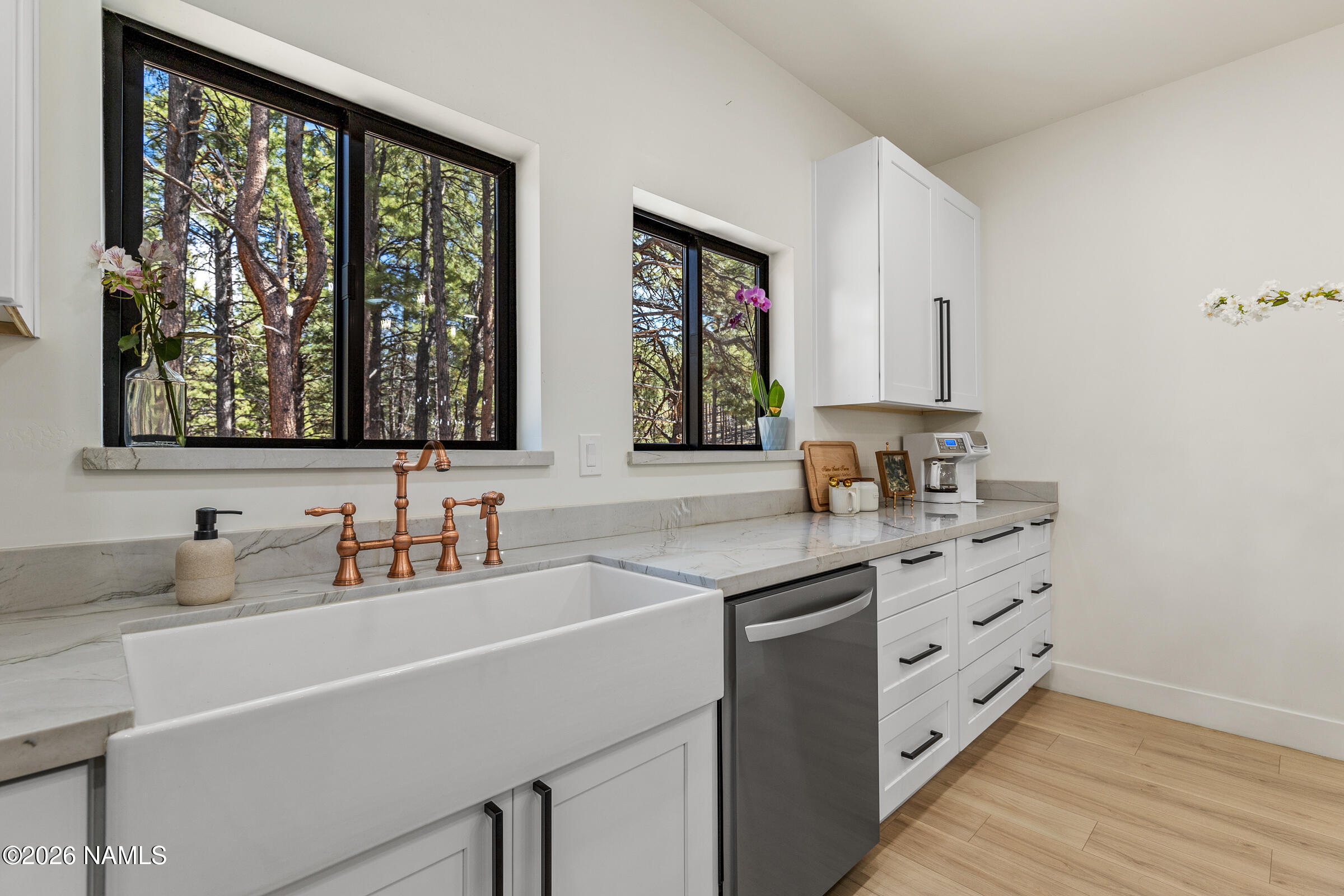 1113 Redwall Way Williams, AZ 86046 - Photo 16 of 53 a kitchen with stainless steel appliances a sink stove and a window
