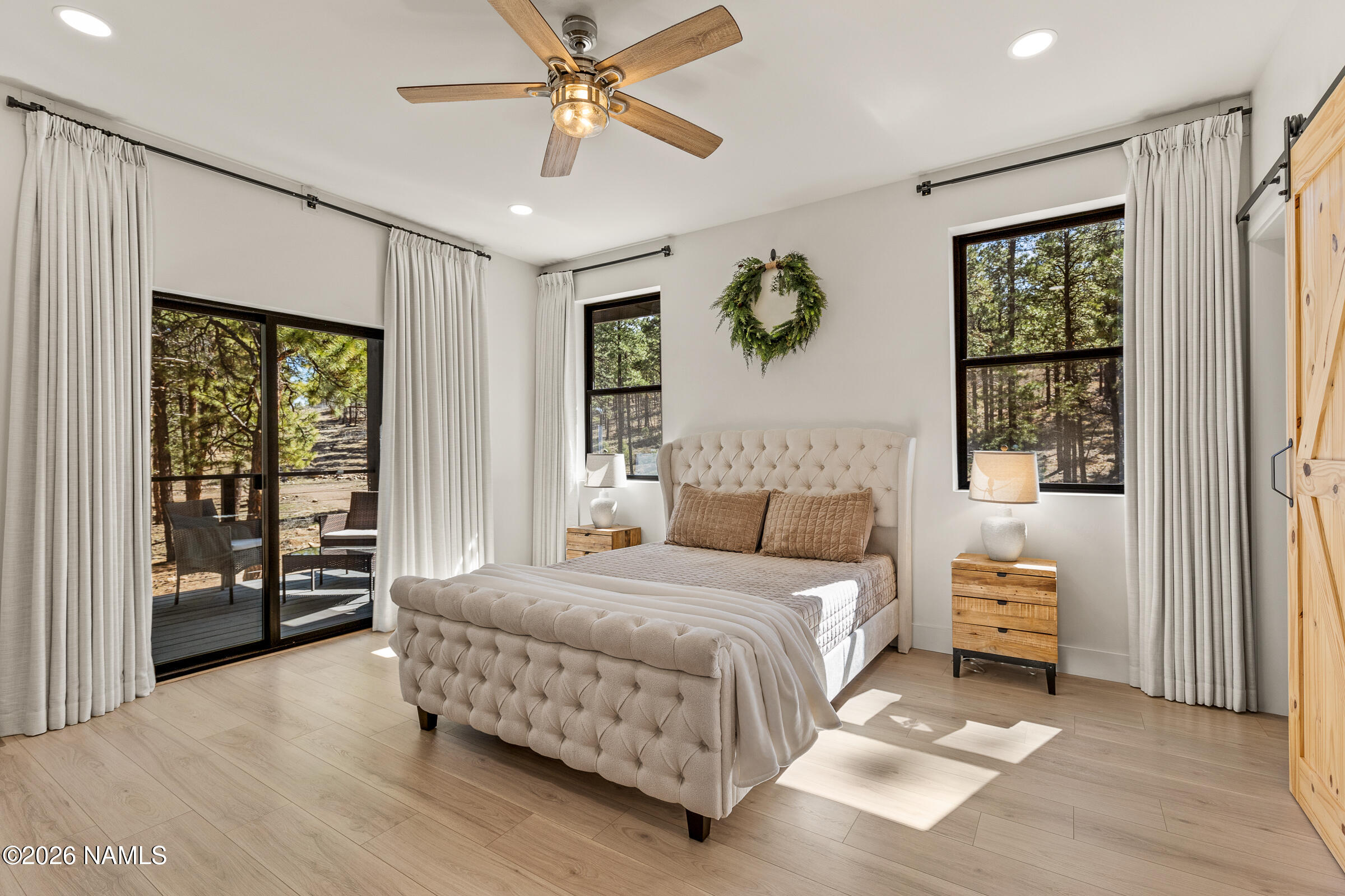 1113 Redwall Way Williams, AZ 86046 - Photo 17 of 53 a bedroom with a bed and a window