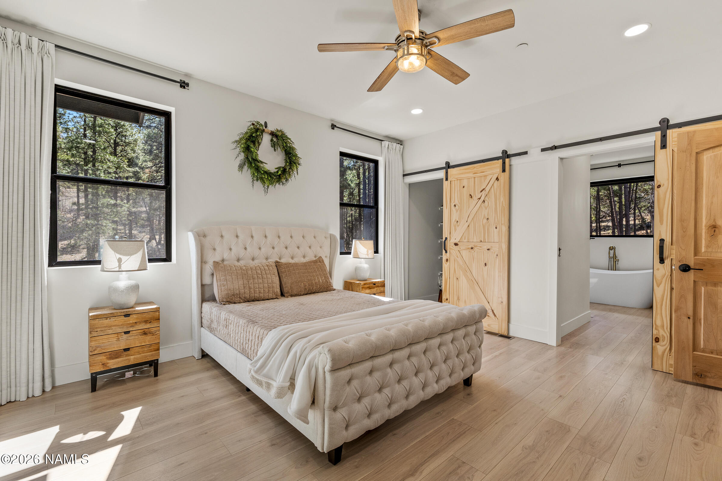 1113 Redwall Way Williams, AZ 86046 - Photo 18 of 53 a bedroom with a bed closet and a window