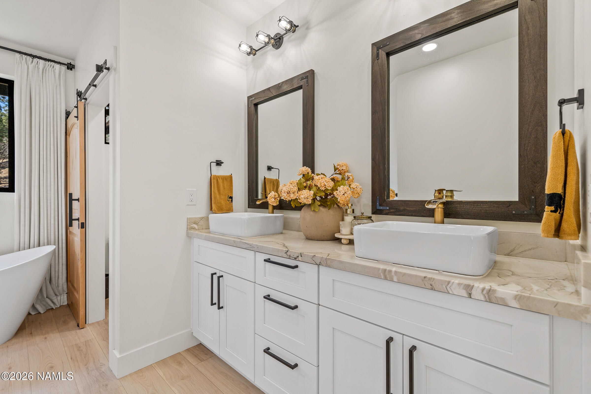 1113 Redwall Way Williams, AZ 86046 - Photo 20 of 53 a bathroom with double vanity sink and a mirror