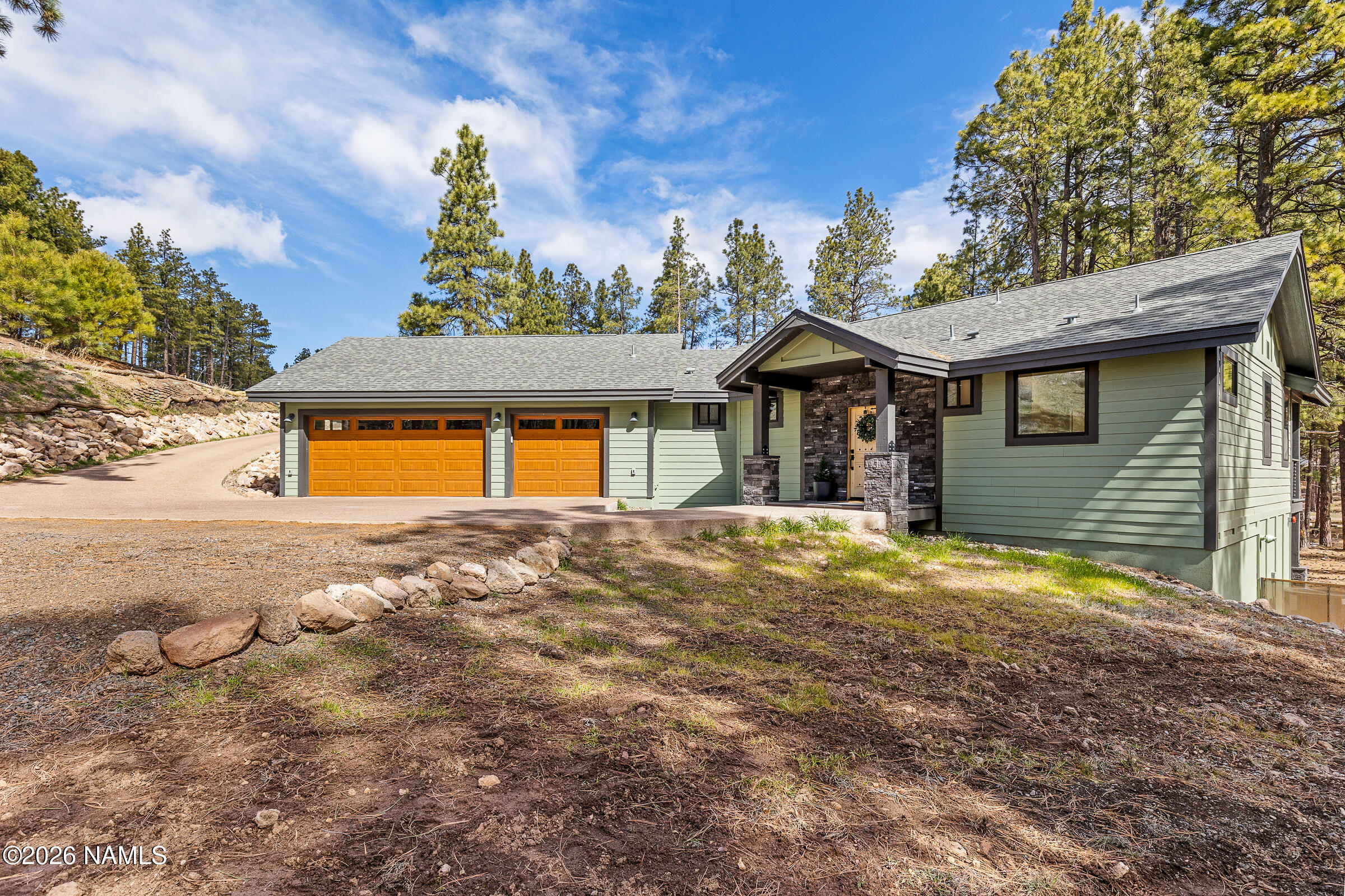 1113 Redwall Way Williams, AZ 86046 - Photo 2 of 53 a front view of a house with a yard