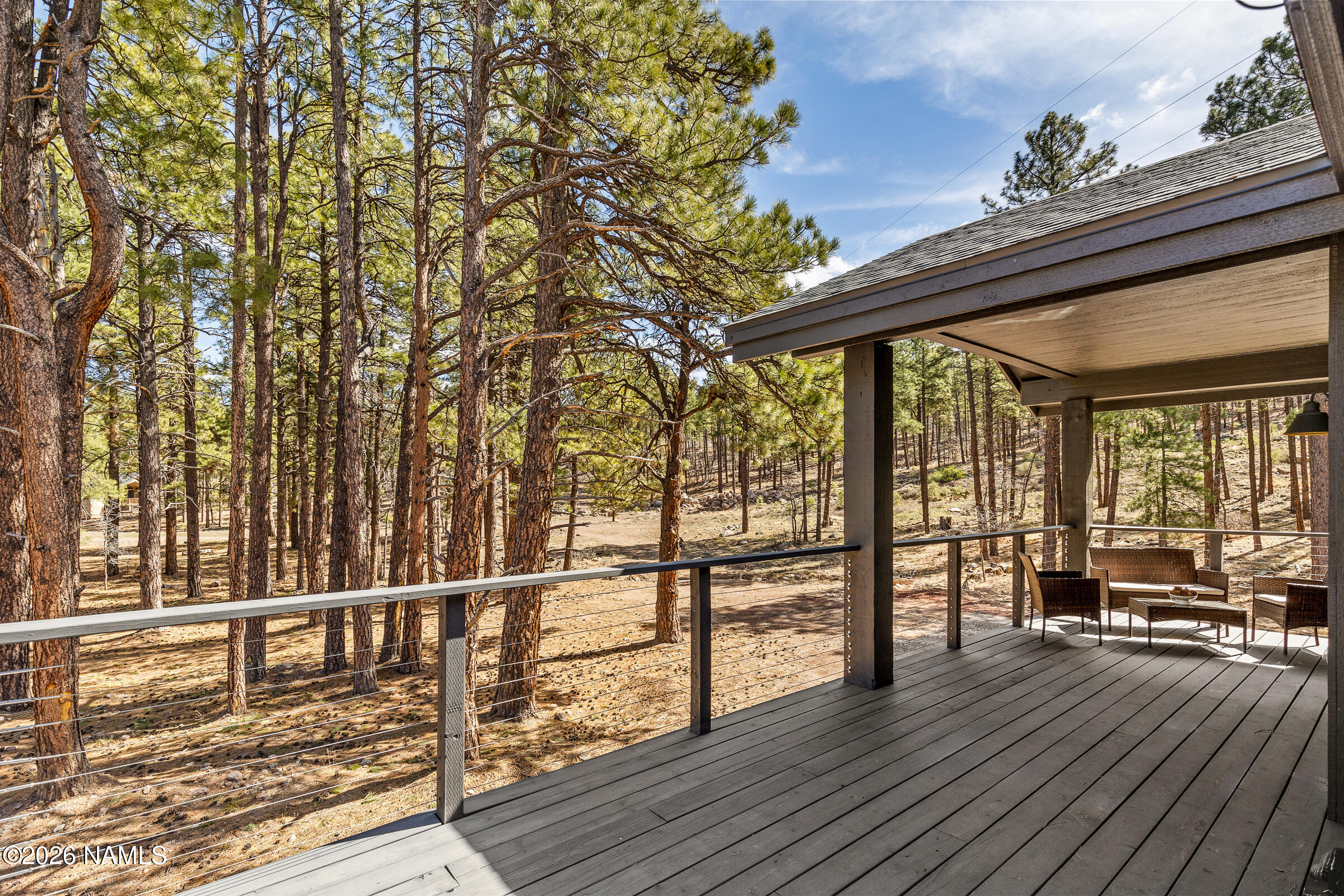 1113 Redwall Way Williams, AZ 86046 - Photo 23 of 53 a view of a living room and wooden floor