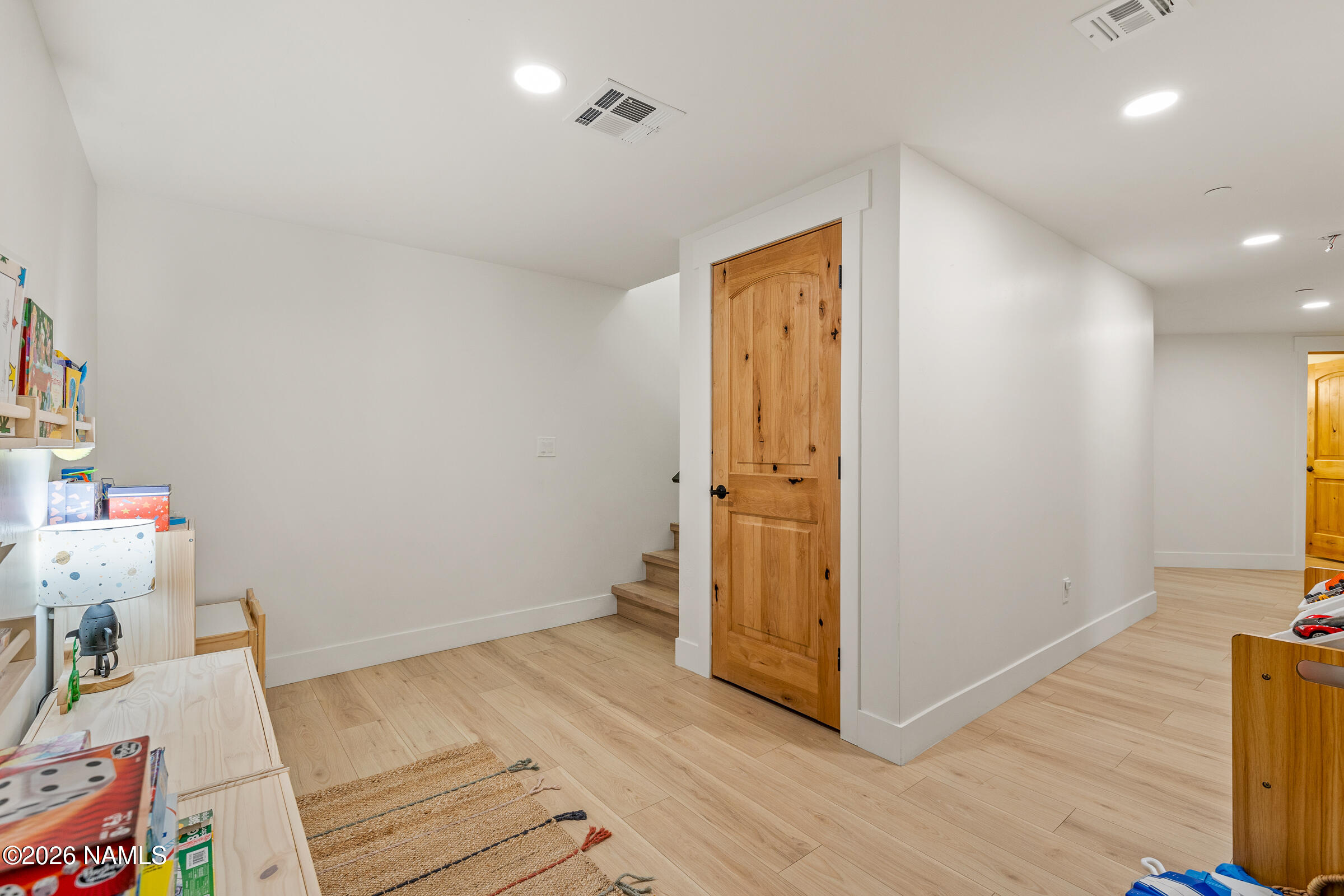 1113 Redwall Way Williams, AZ 86046 - Photo 24 of 53 a view of a room with wooden floor and cabinet