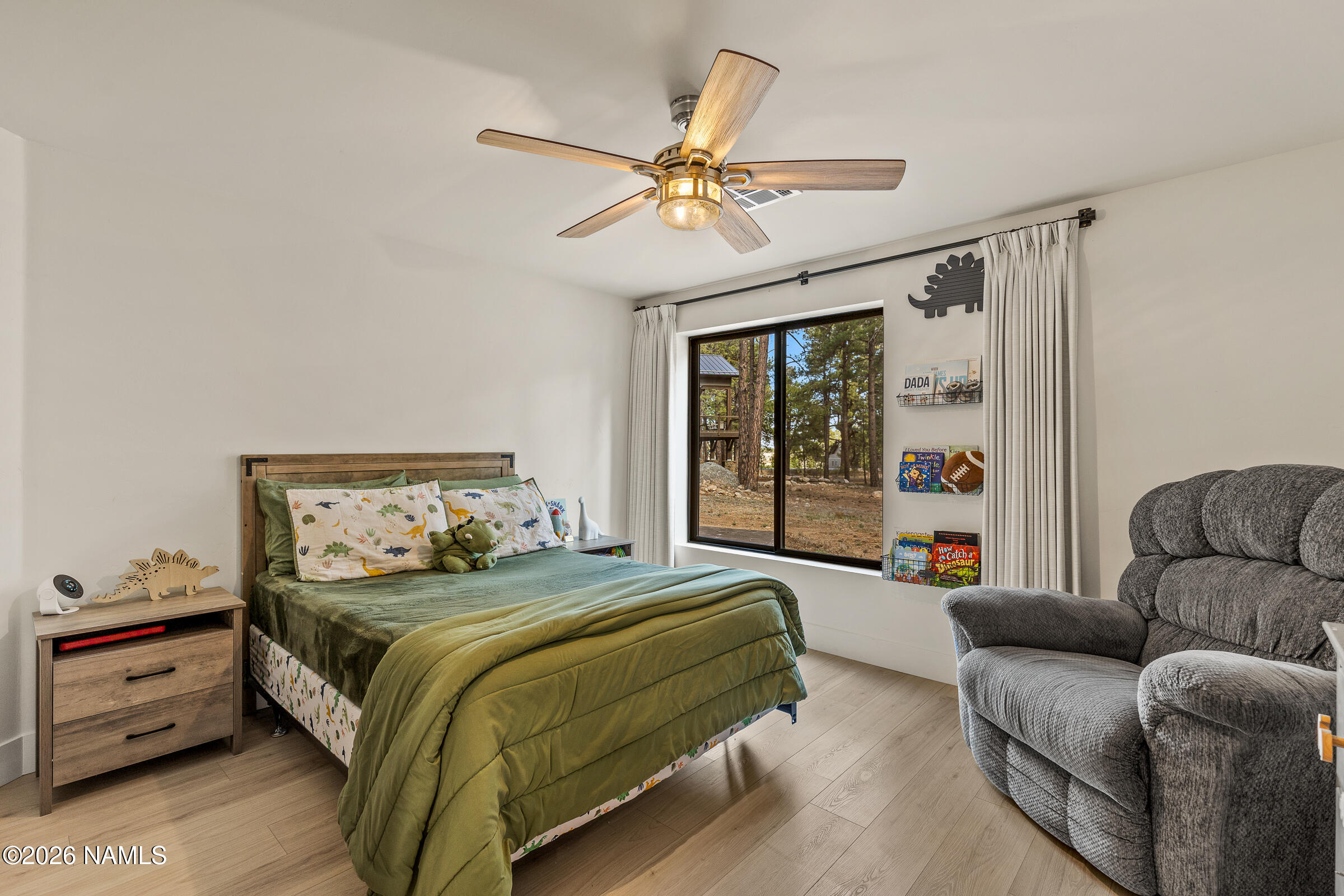 1113 Redwall Way Williams, AZ 86046 - Photo 26 of 53 a bedroom with a bed couch and window