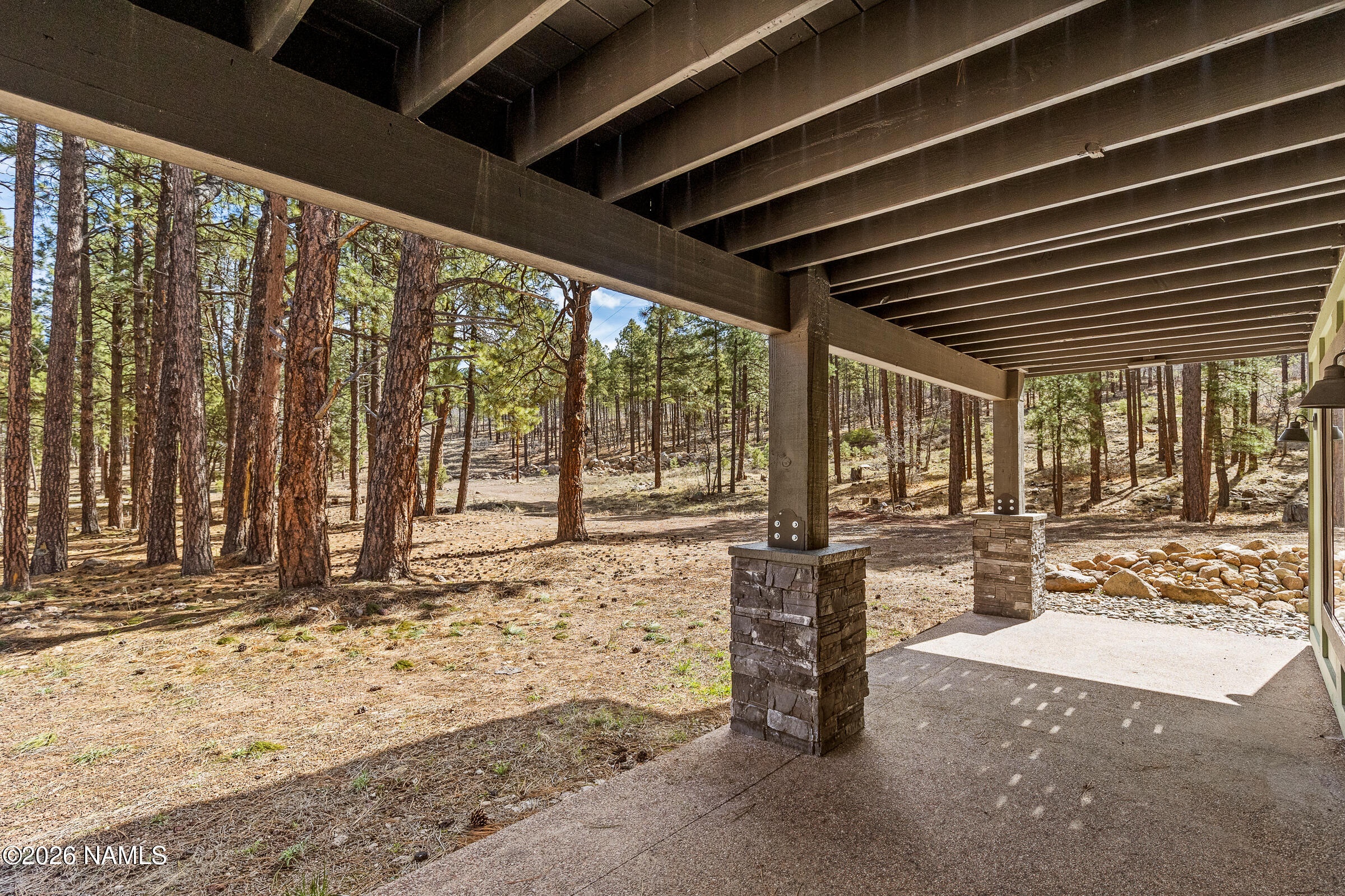 1113 Redwall Way Williams, AZ 86046 - Photo 42 of 53 a view of a porch with wooden fence