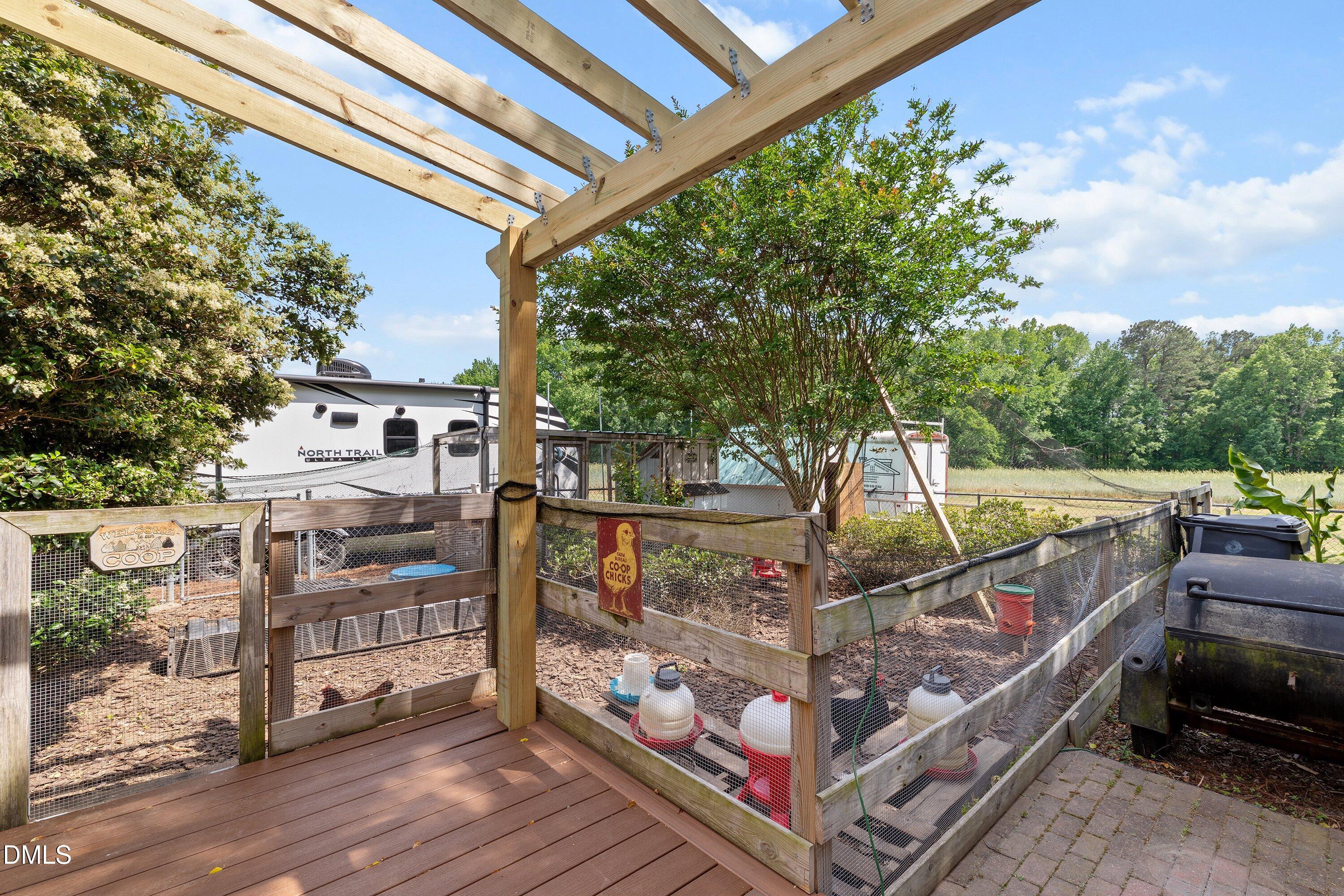 6612 Fowler Road Zebulon, NC 27597 - Photo 40 of 42 a view of a roof deck