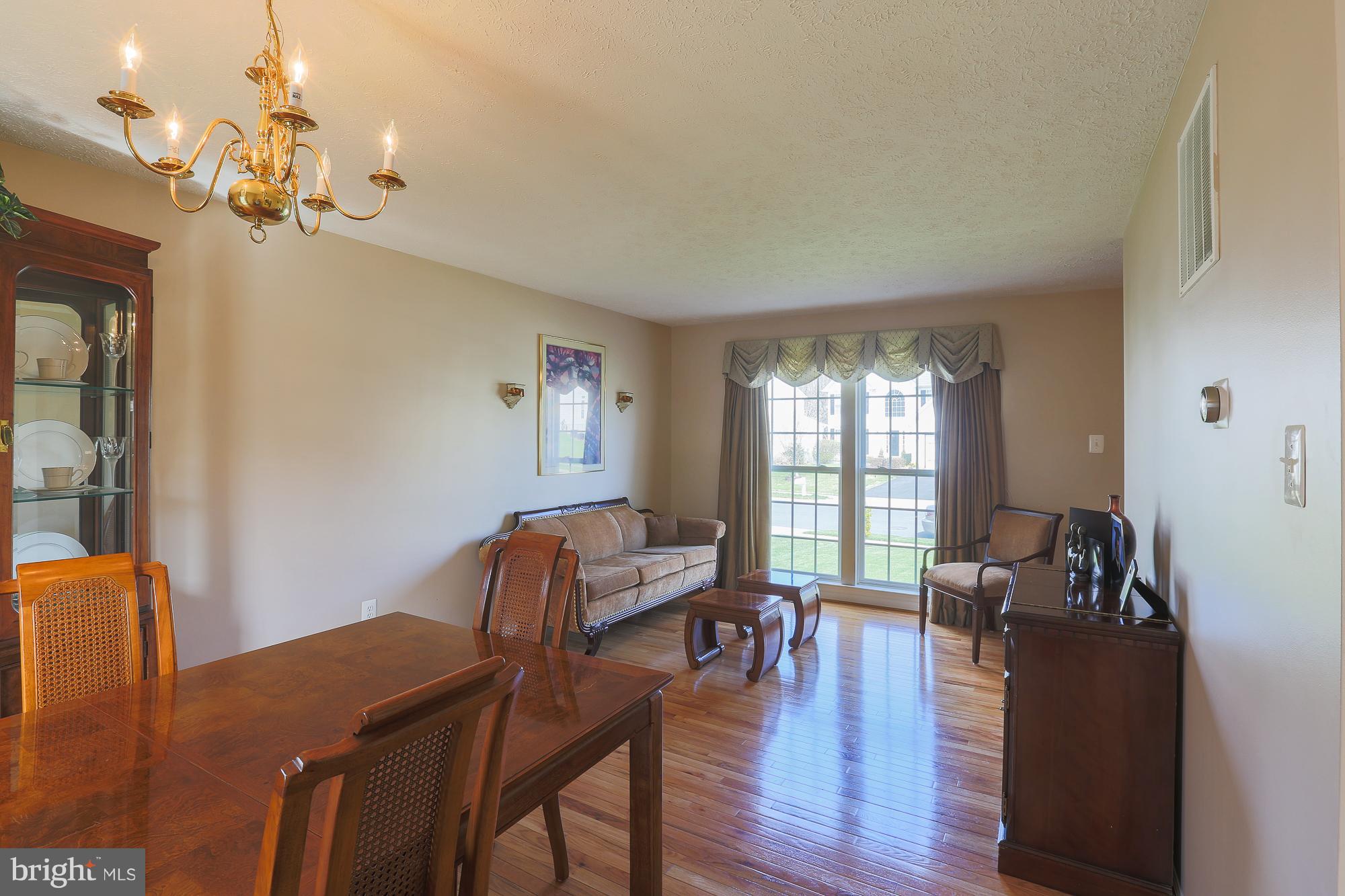 113 Spry Island Road Joppa, MD 21085 - Photo 14 of 28 Sunlit Living Room
