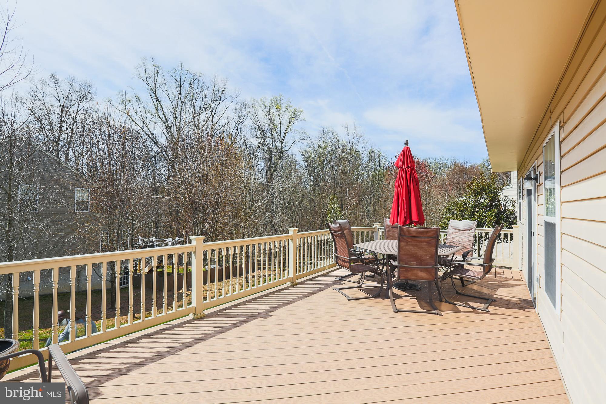 113 Spry Island Road Joppa, MD 21085 - Photo 3 of 28 27' x 11' Expansive Trex Deck For Outdoor Living