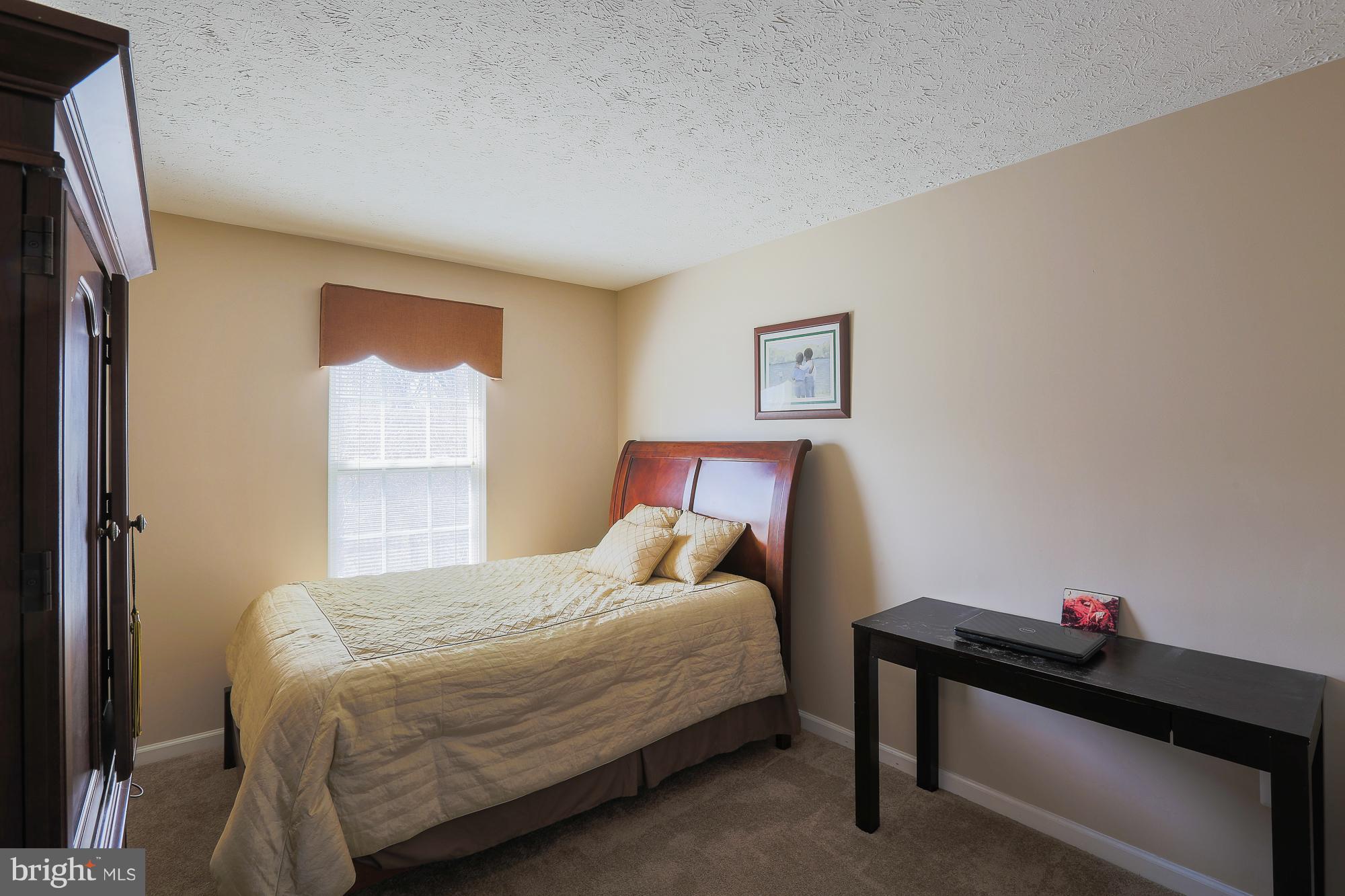 113 Spry Island Road Joppa, MD 21085 - Photo 22 of 28 Guest Bedroom - Neutral Palette Throughout Home