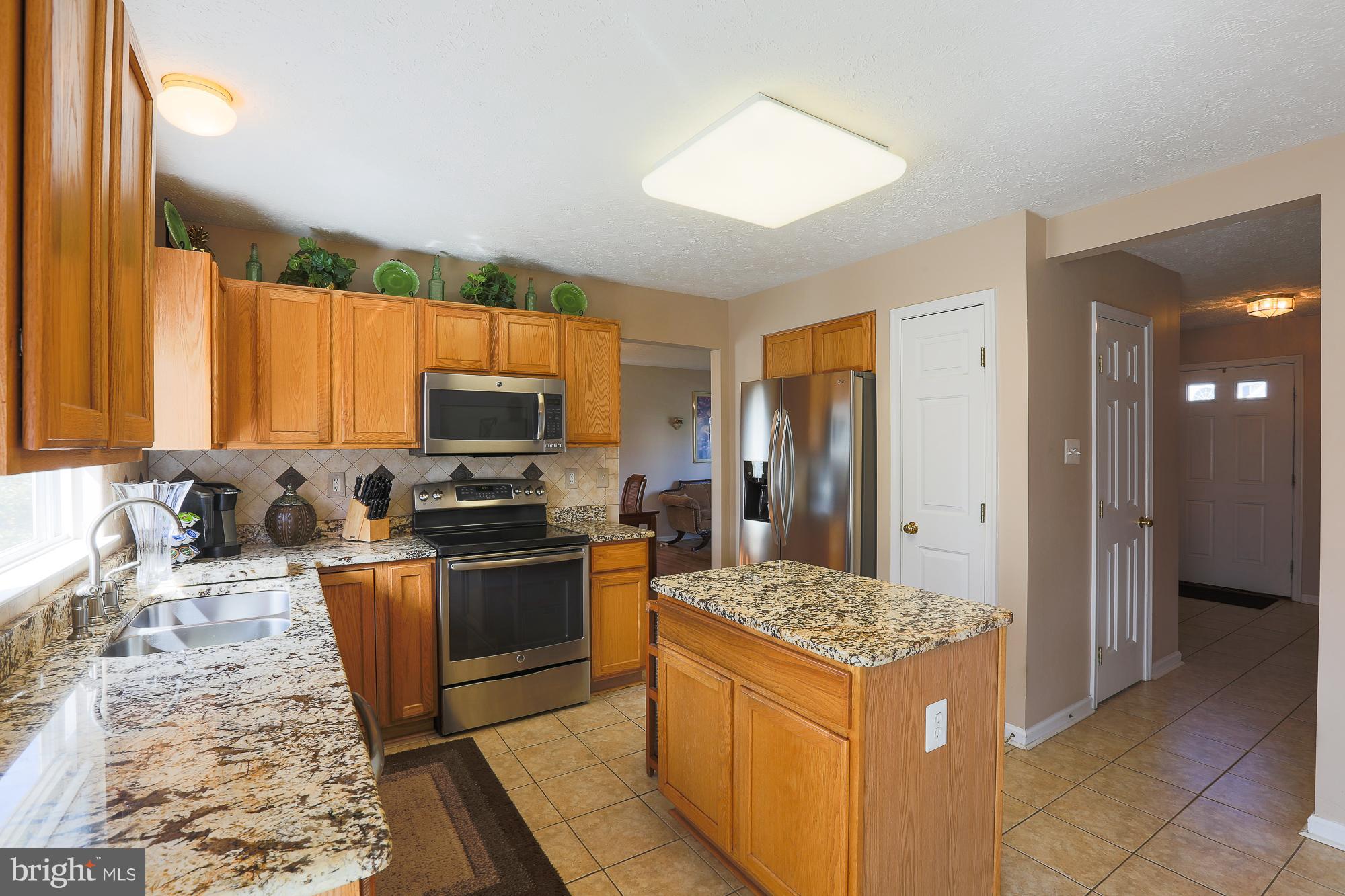 113 Spry Island Road Joppa, MD 21085 - Photo 4 of 28 New Granite Counter Tops And Ceramic Tile Flooring