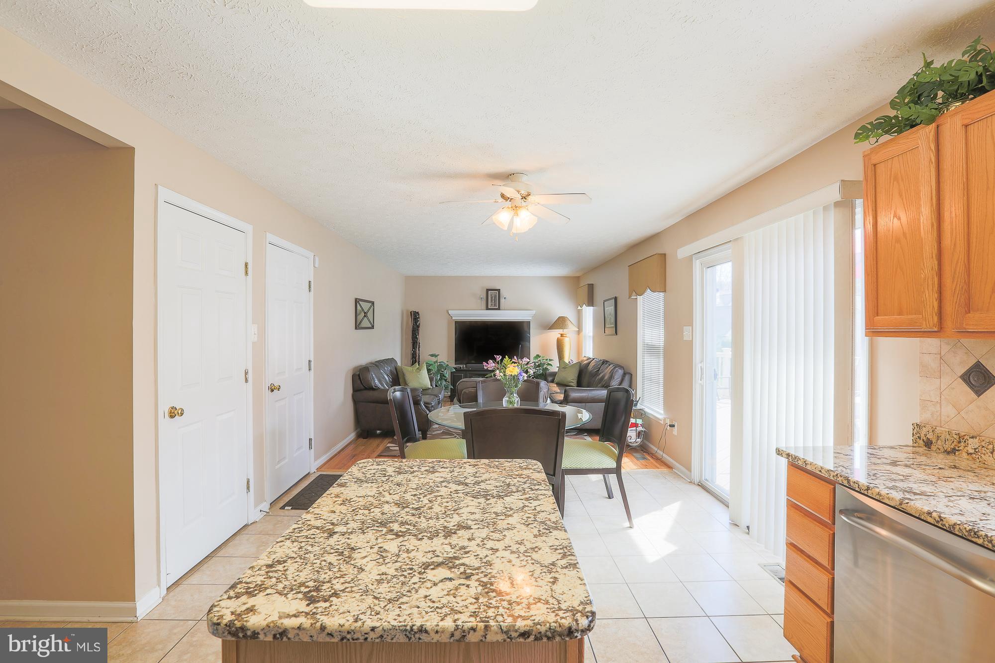 113 Spry Island Road Joppa, MD 21085 - Photo 9 of 28 The View From Eat In Kitchen to Family Room