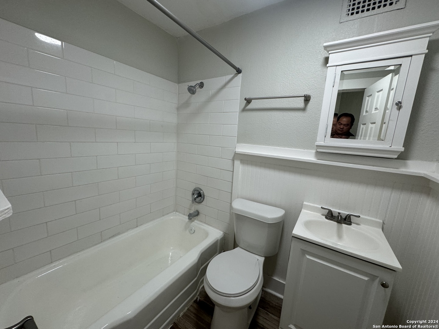 407 East Locust Street, Unit 2 San Antonio, TX 78212 - Photo 7 of 7 a bathroom with a toilet and a bathtub