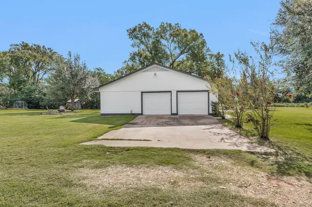 a house with a yard in front of it