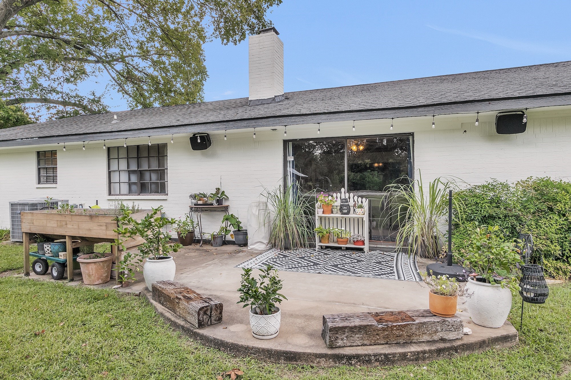 21251 Old River Road Washington, TX 77880 - Photo 15 of 20 a view of a house with backyard porch and sitting area