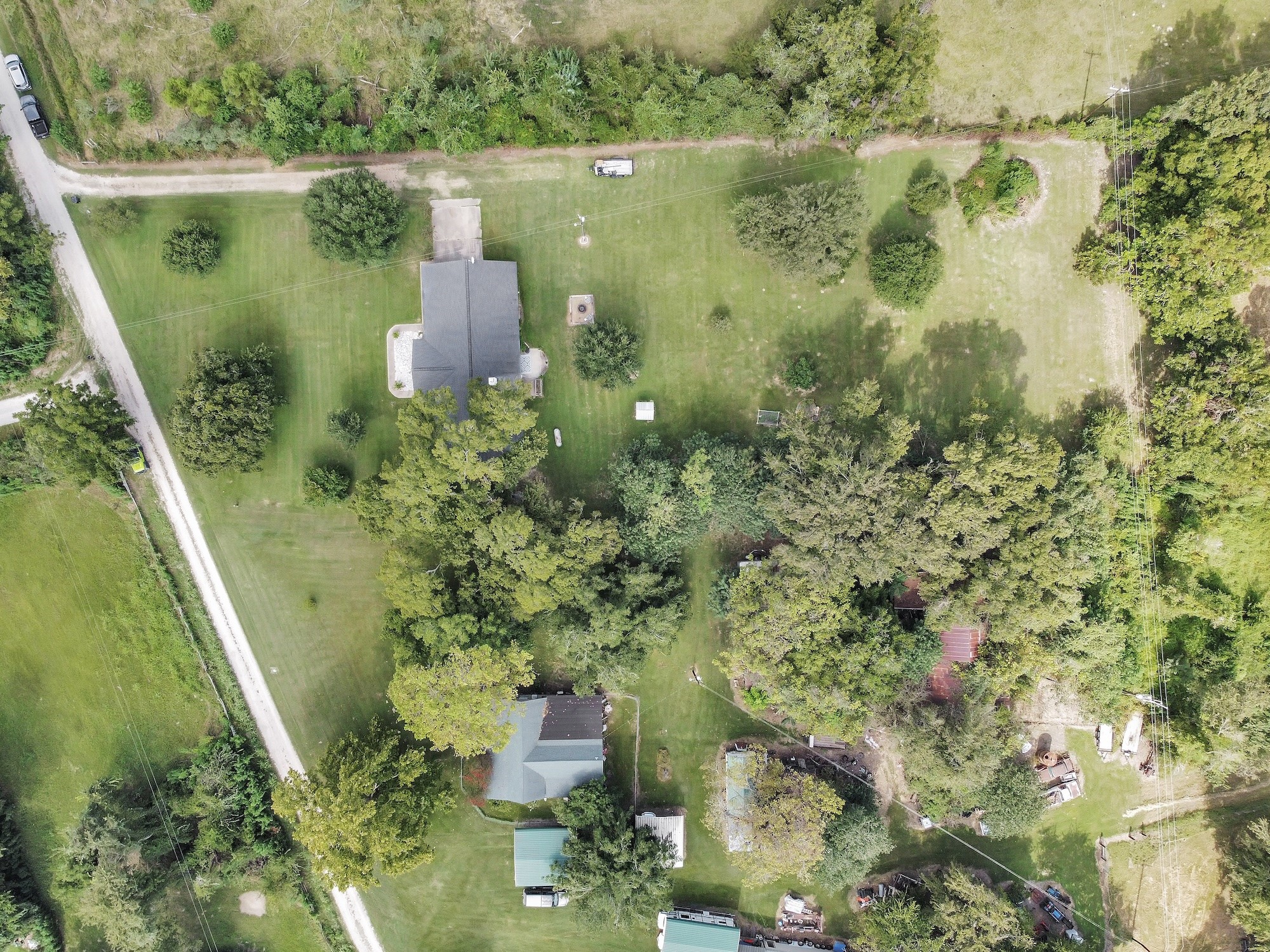 21251 Old River Road Washington, TX 77880 - Photo 19 of 20 a view of a lake with a yard