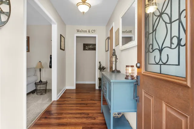 a view of a kitchen from the hallway