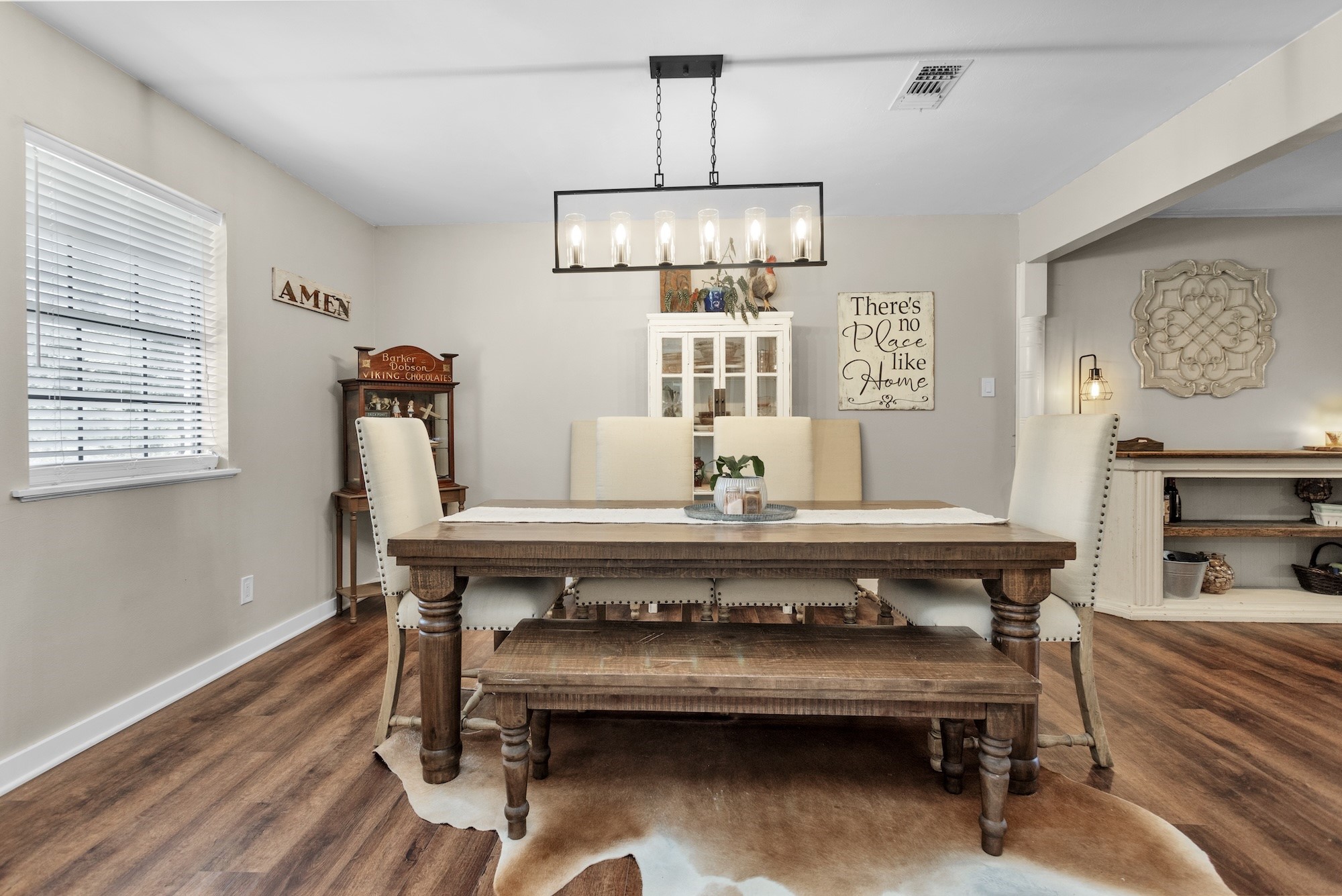 21251 Old River Road Washington, TX 77880 - Photo 8 of 20 a view of a dining room with furniture window and wooden floor