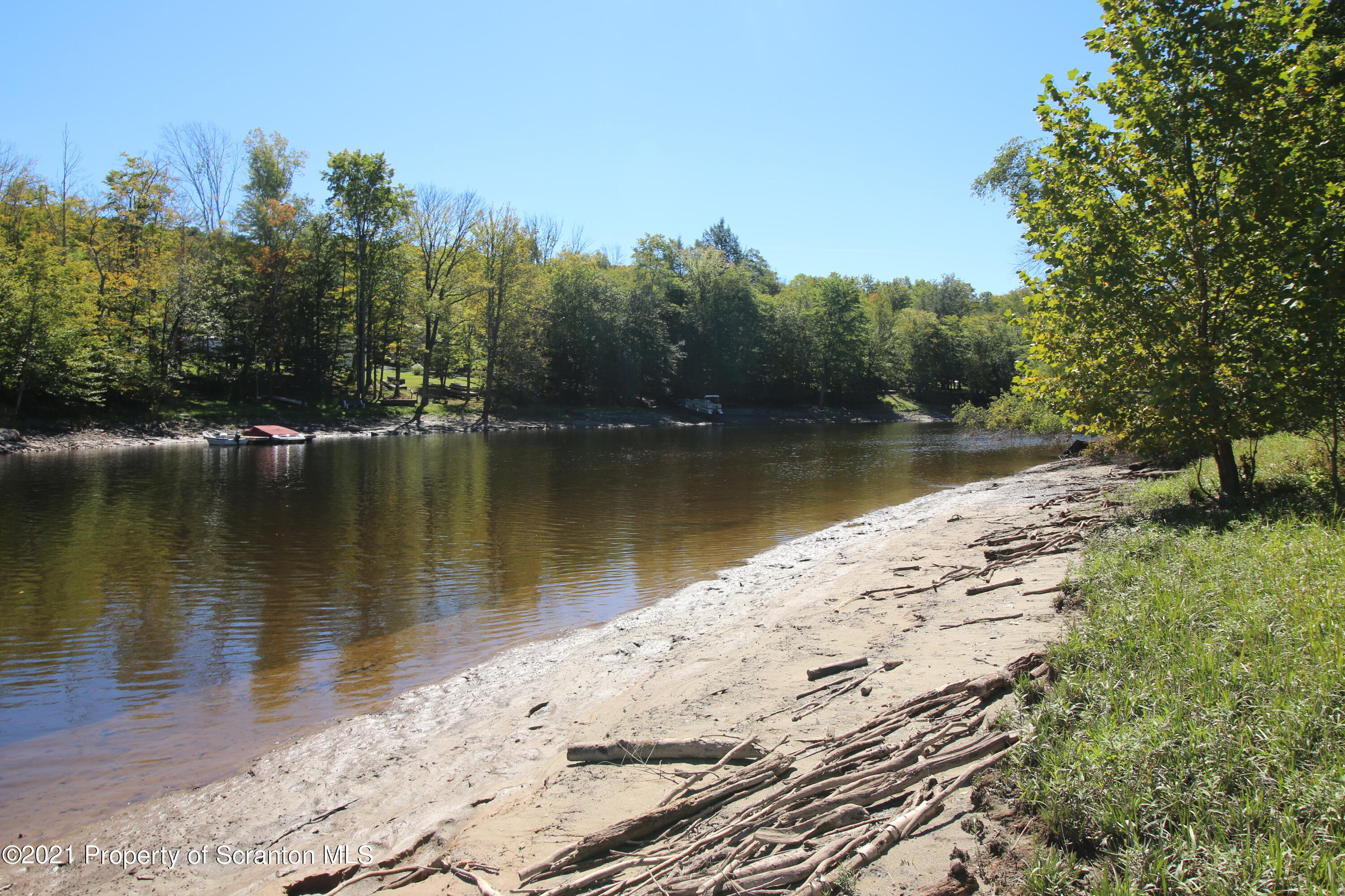 280 Sterling Shore Road Lake Ariel, PA 18436 - Photo 2 of 7 a view of a lake with a large trees