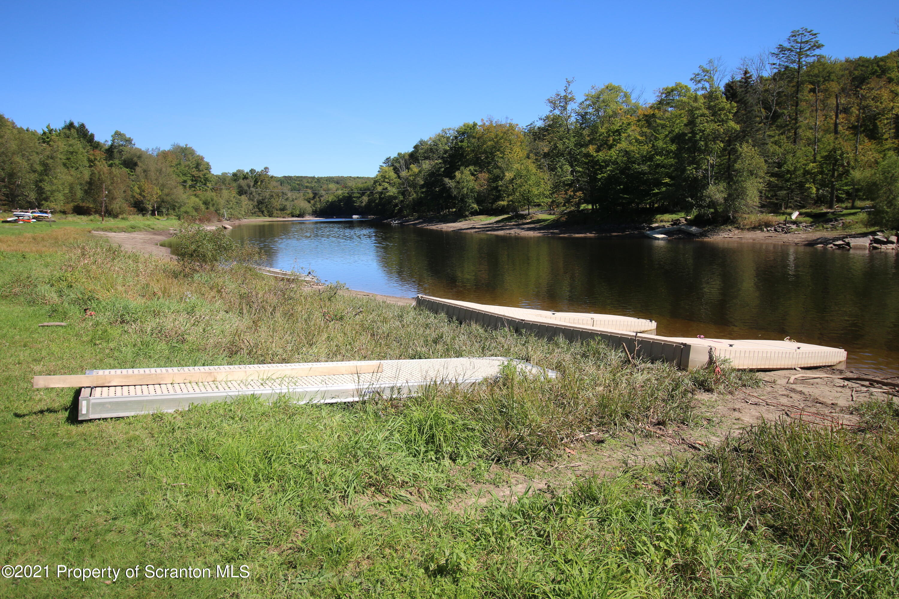280 Sterling Shore Road Lake Ariel, PA 18436 - Photo 3 of 7 a view of lake with a house in the background