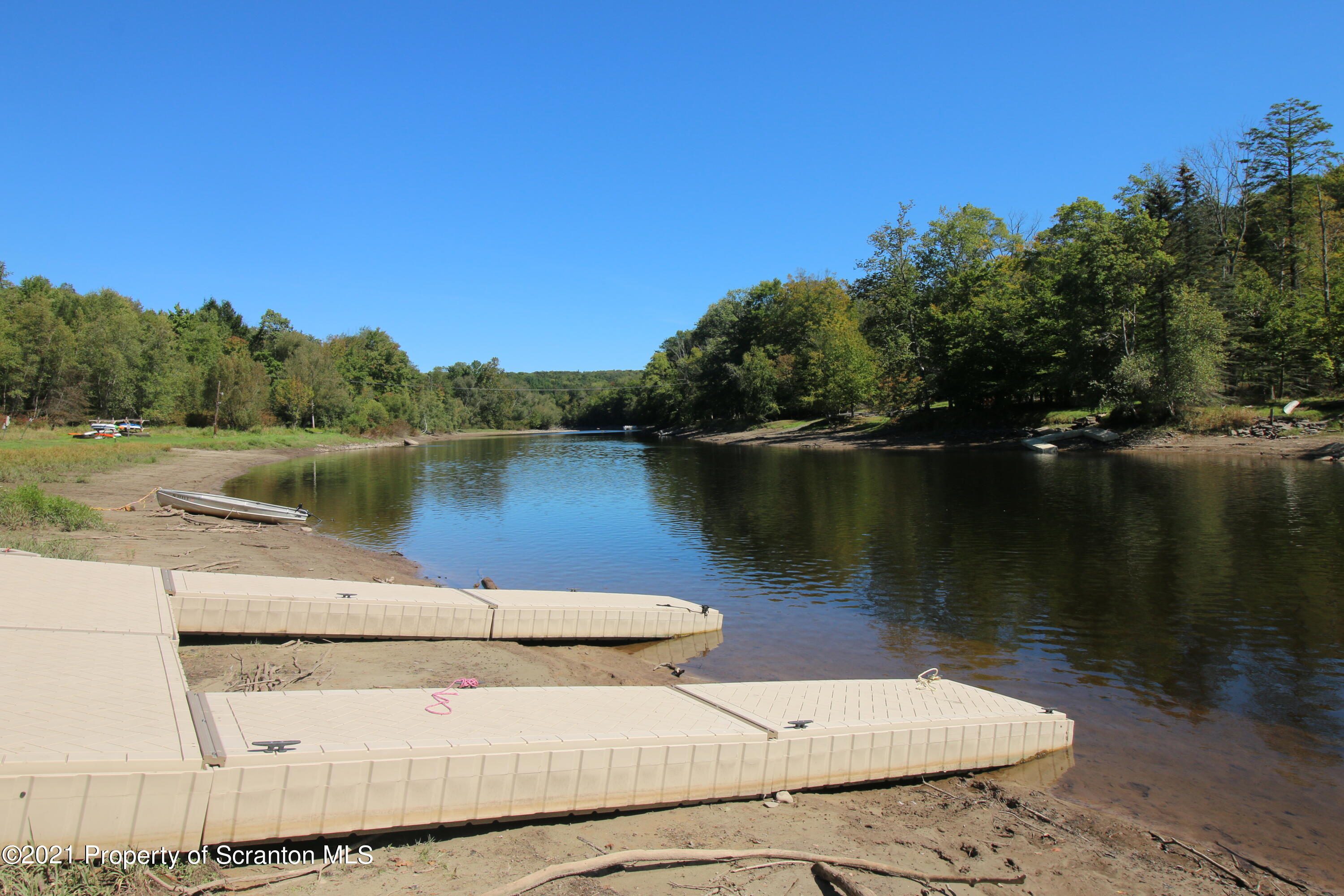 280 Sterling Shore Road Lake Ariel, PA 18436 - Photo 4 of 7 a view of a lake with houses