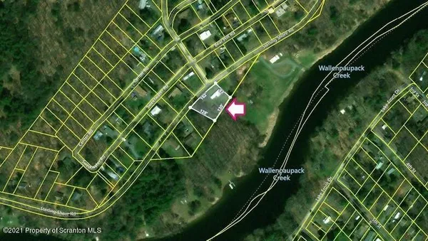 a view of swimming pool from a balcony