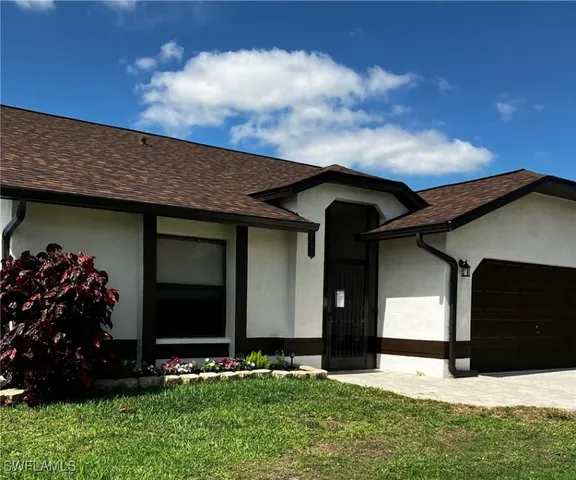 a house view with garden space