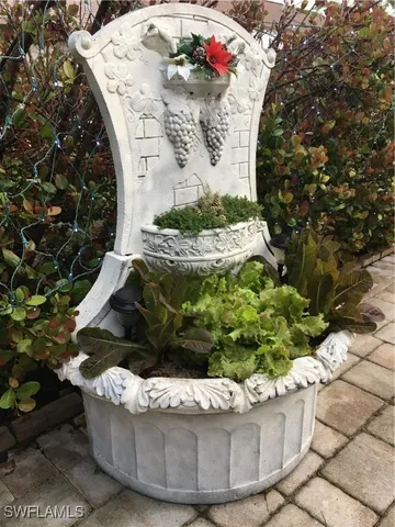 a view of a backyard with garden and plants