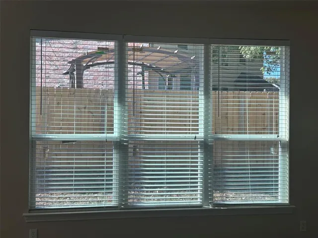 a view of a balcony and window