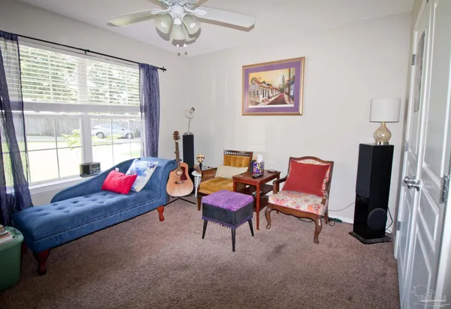 a bathroom with a sink vanity and mirror